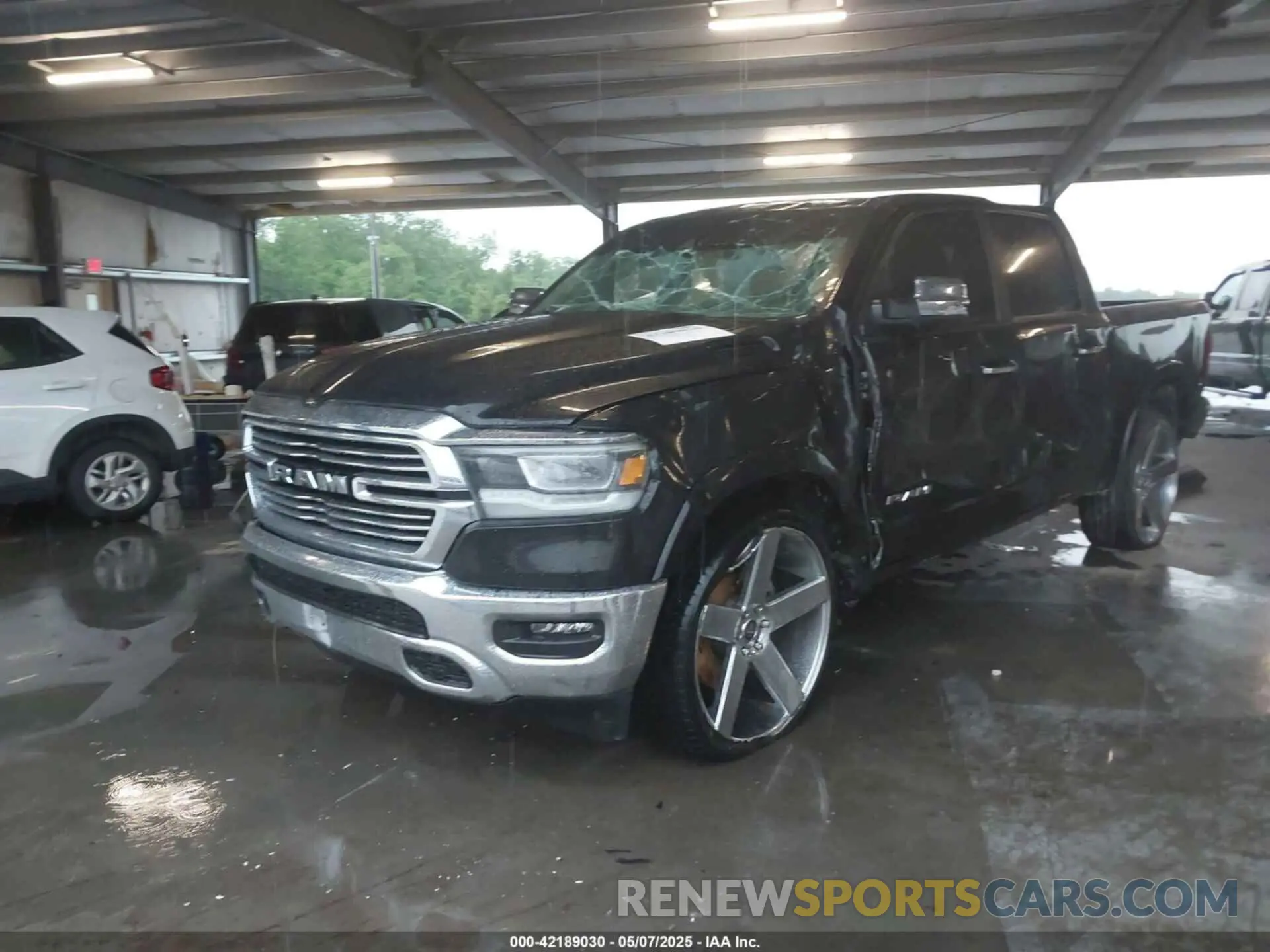 2 Photograph of a damaged car 1C6RREJT6MN768388 RAM 1500 2021