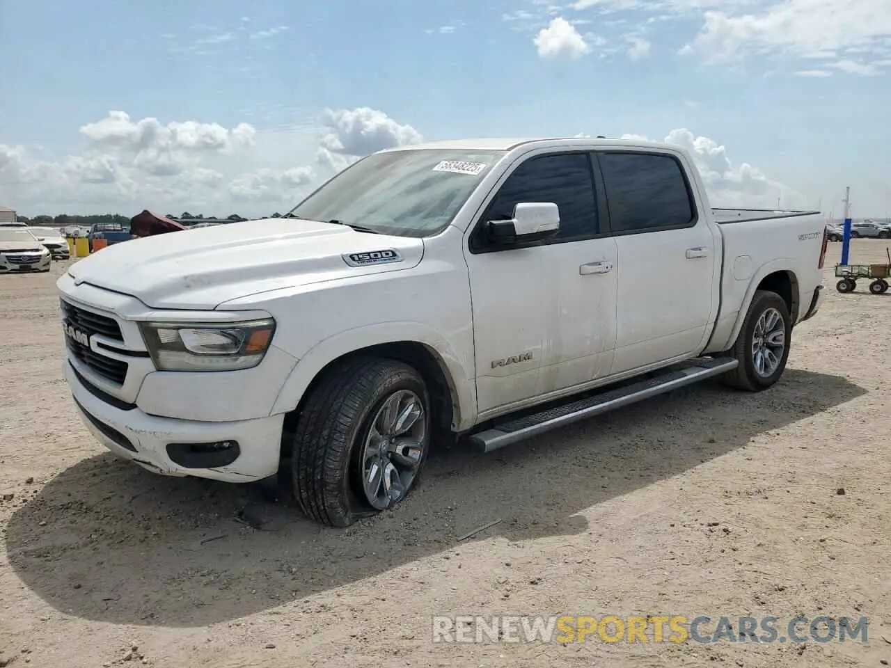 1 Photograph of a damaged car 1C6RREJT9MN501522 RAM 1500 2021