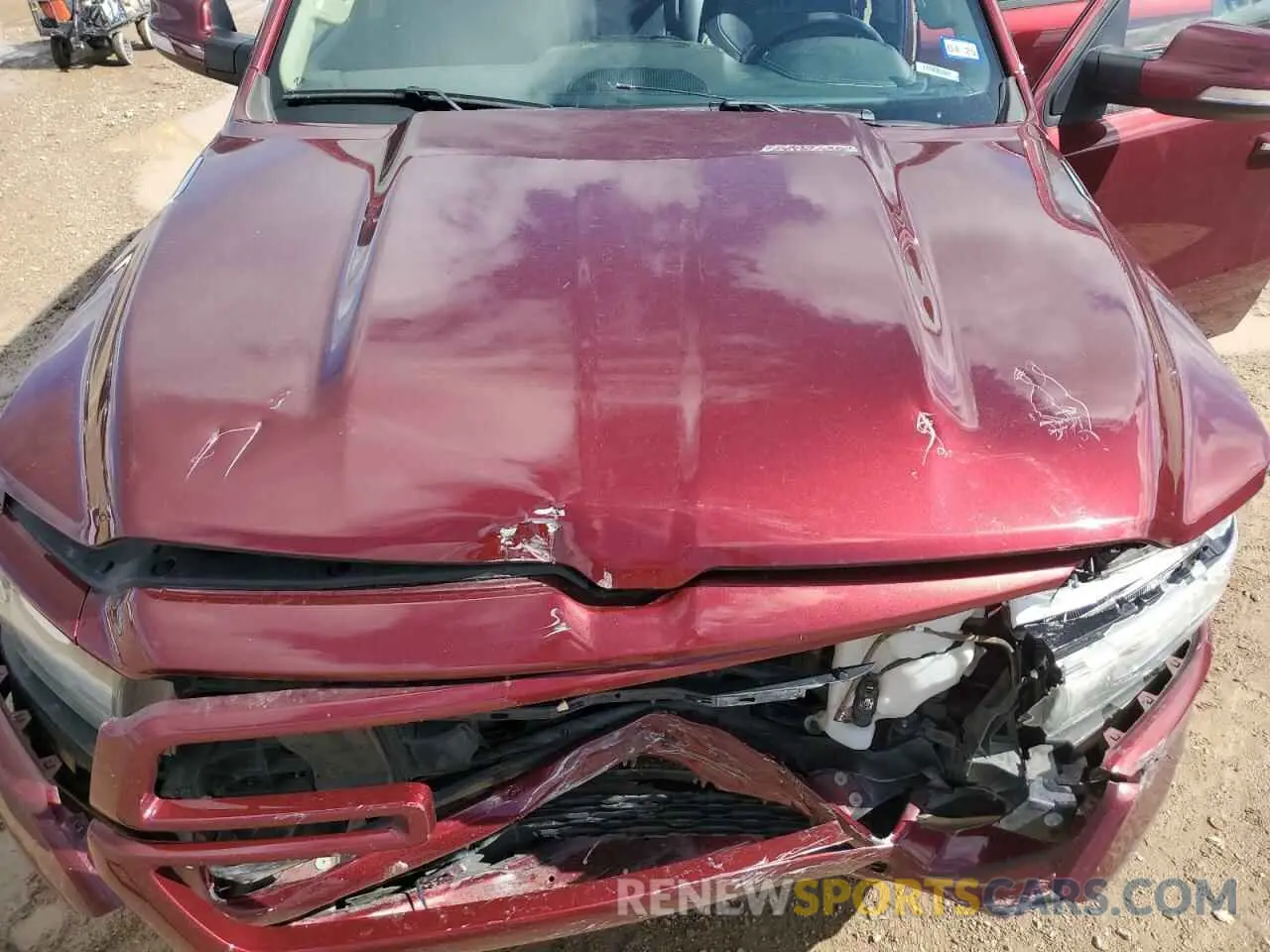 11 Photograph of a damaged car 1C6RREJT9MN608618 RAM 1500 2021