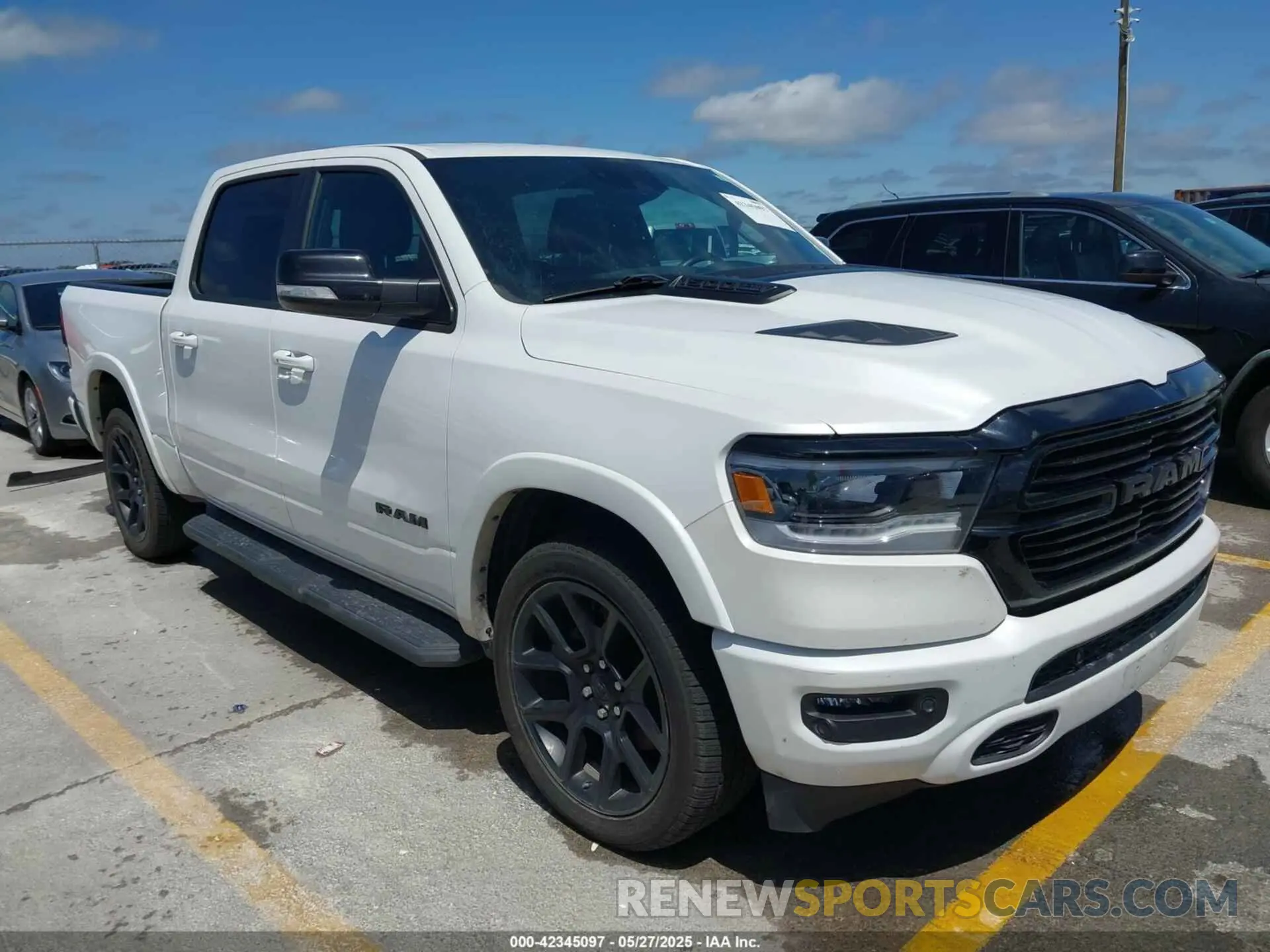 1 Photograph of a damaged car 1C6RREJTXMN704600 RAM 1500 2021