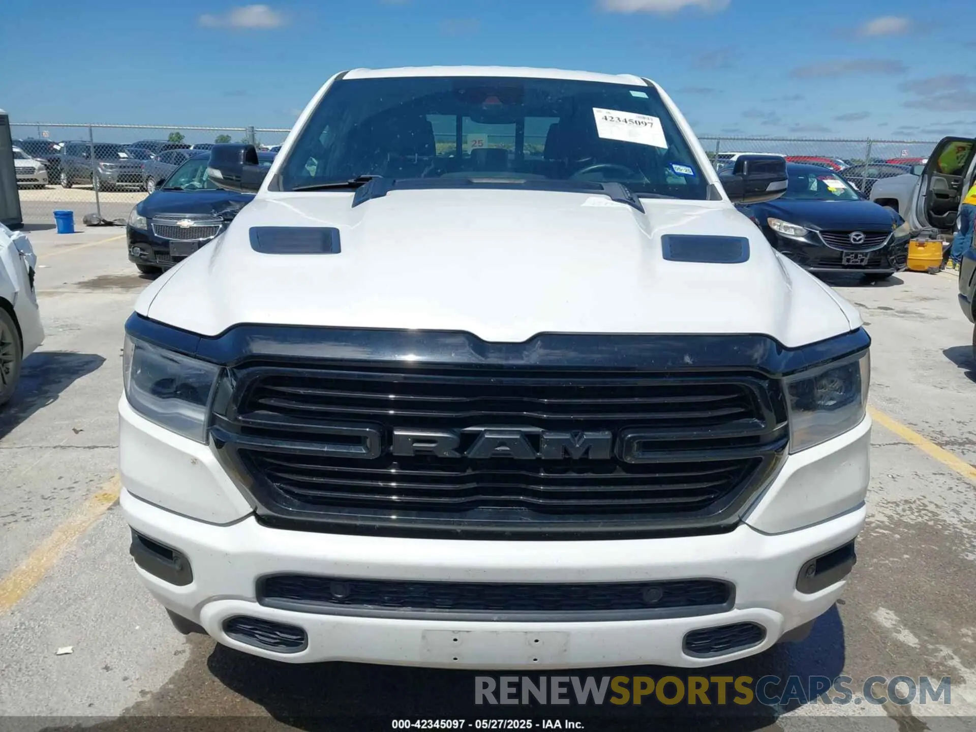 12 Photograph of a damaged car 1C6RREJTXMN704600 RAM 1500 2021