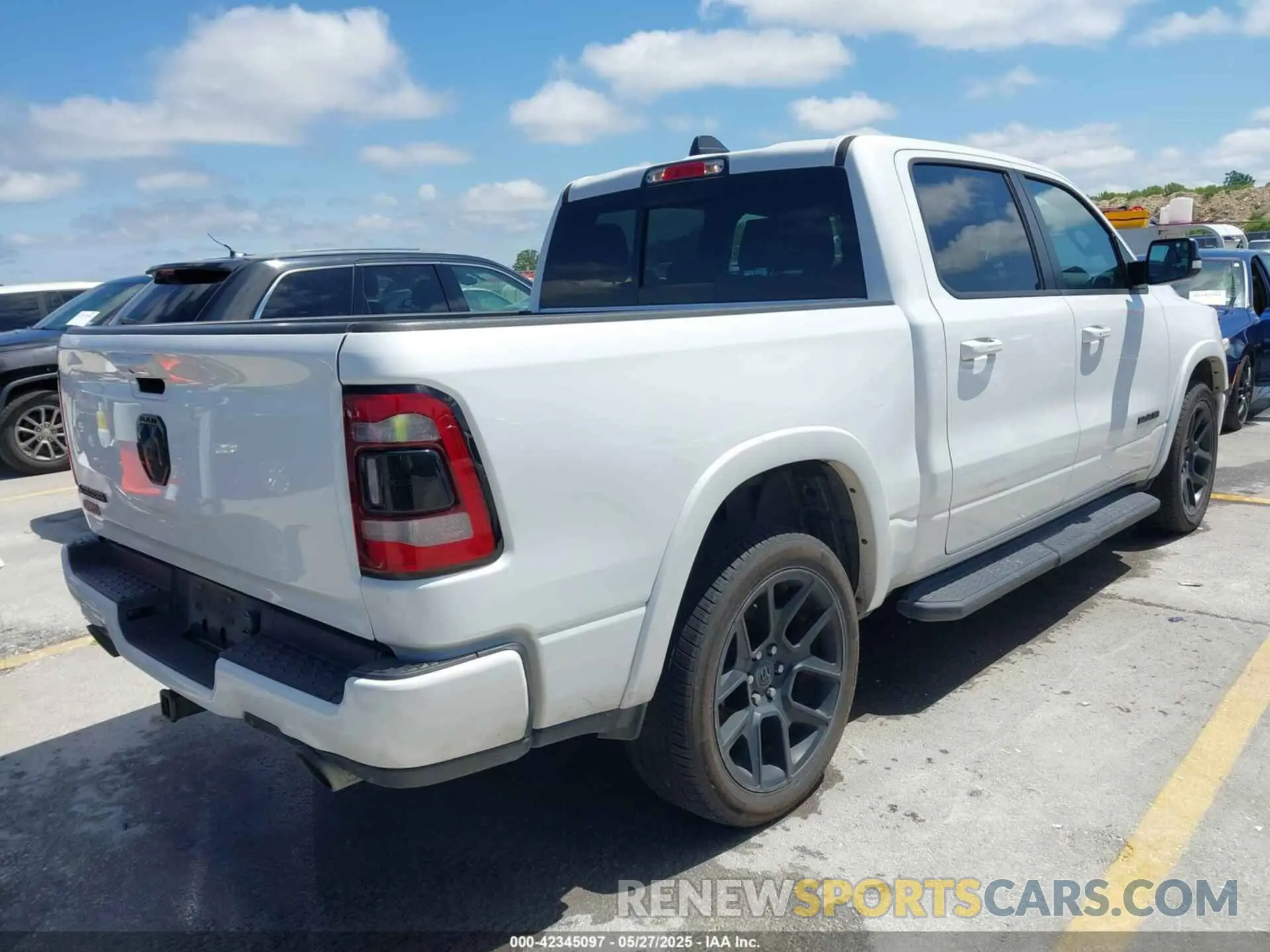4 Photograph of a damaged car 1C6RREJTXMN704600 RAM 1500 2021