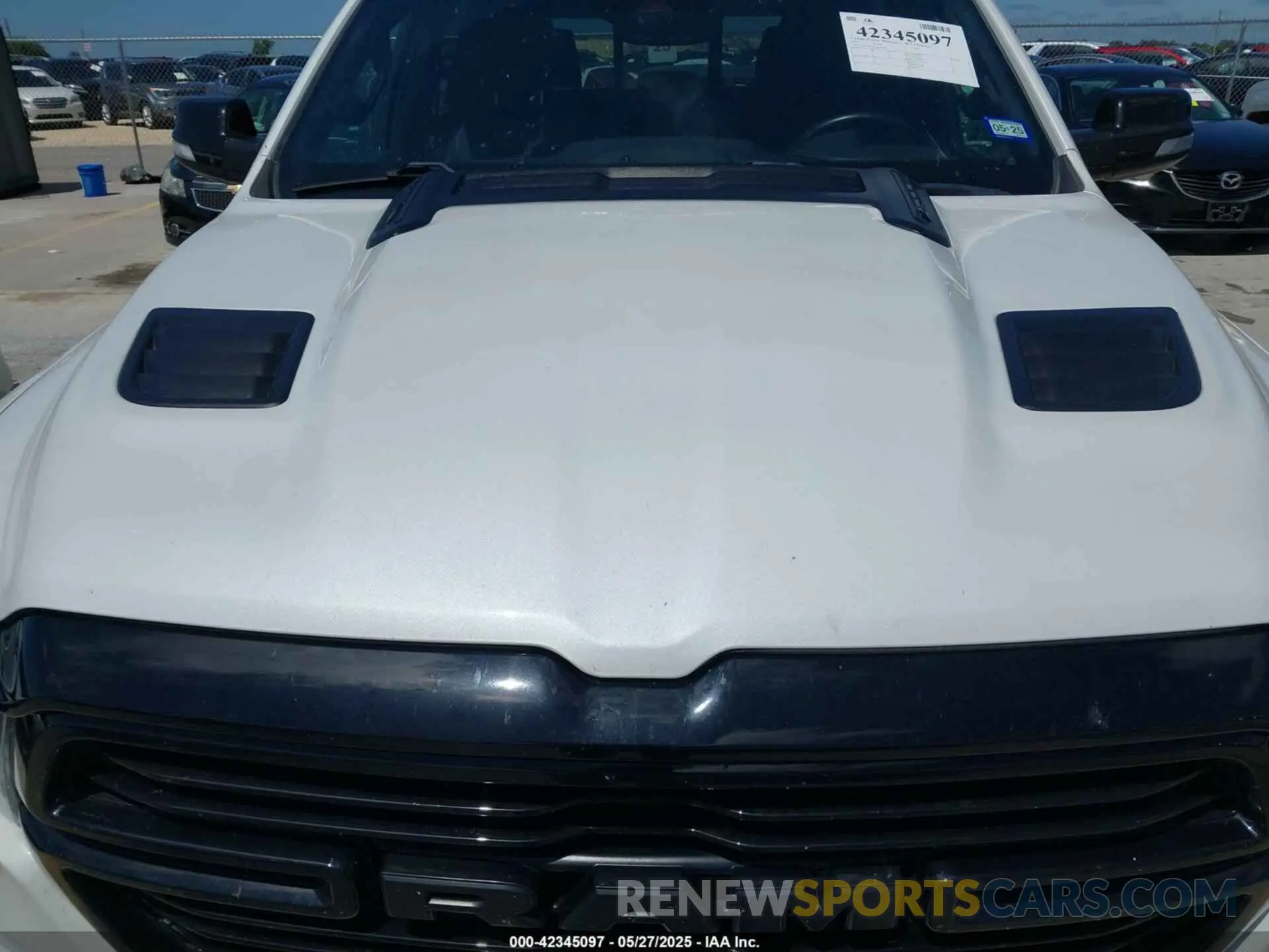 6 Photograph of a damaged car 1C6RREJTXMN704600 RAM 1500 2021