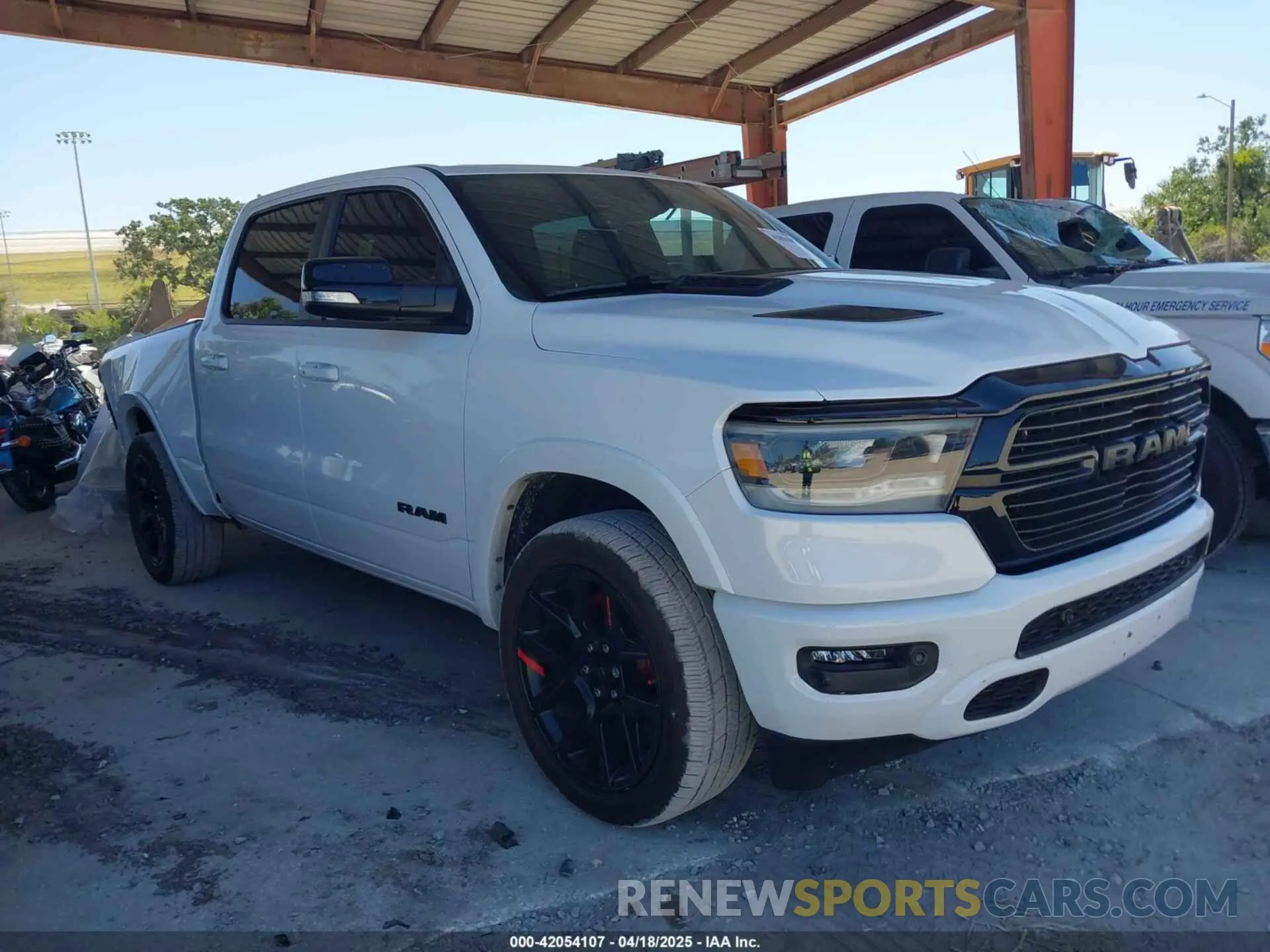 1 Photograph of a damaged car 1C6RREJTXMN794380 RAM 1500 2021