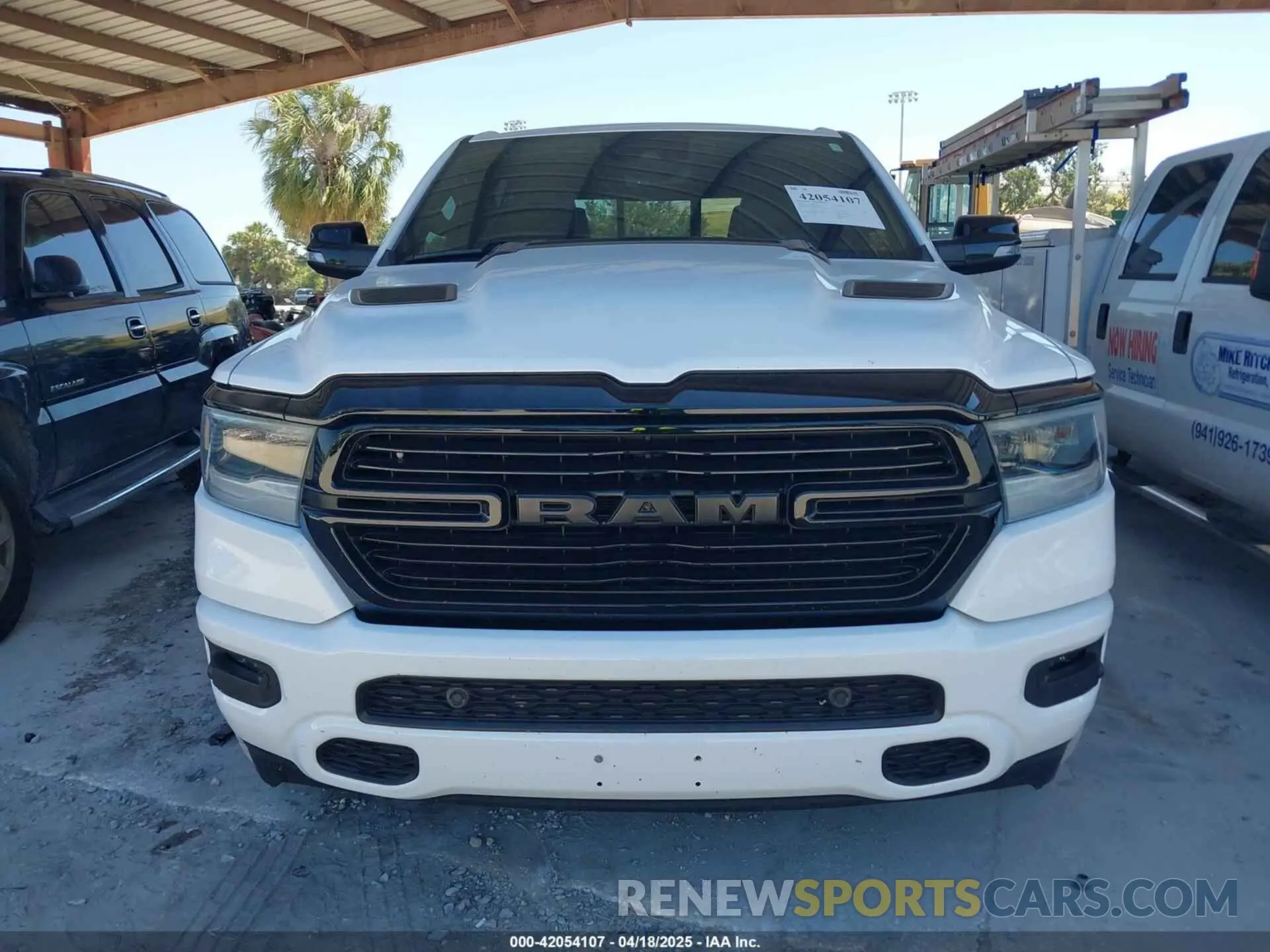 12 Photograph of a damaged car 1C6RREJTXMN794380 RAM 1500 2021