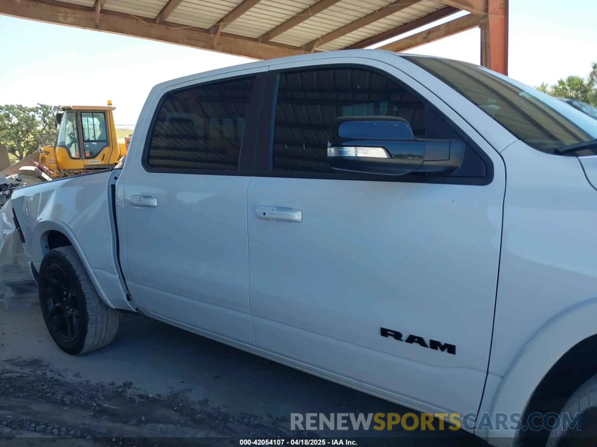 13 Photograph of a damaged car 1C6RREJTXMN794380 RAM 1500 2021
