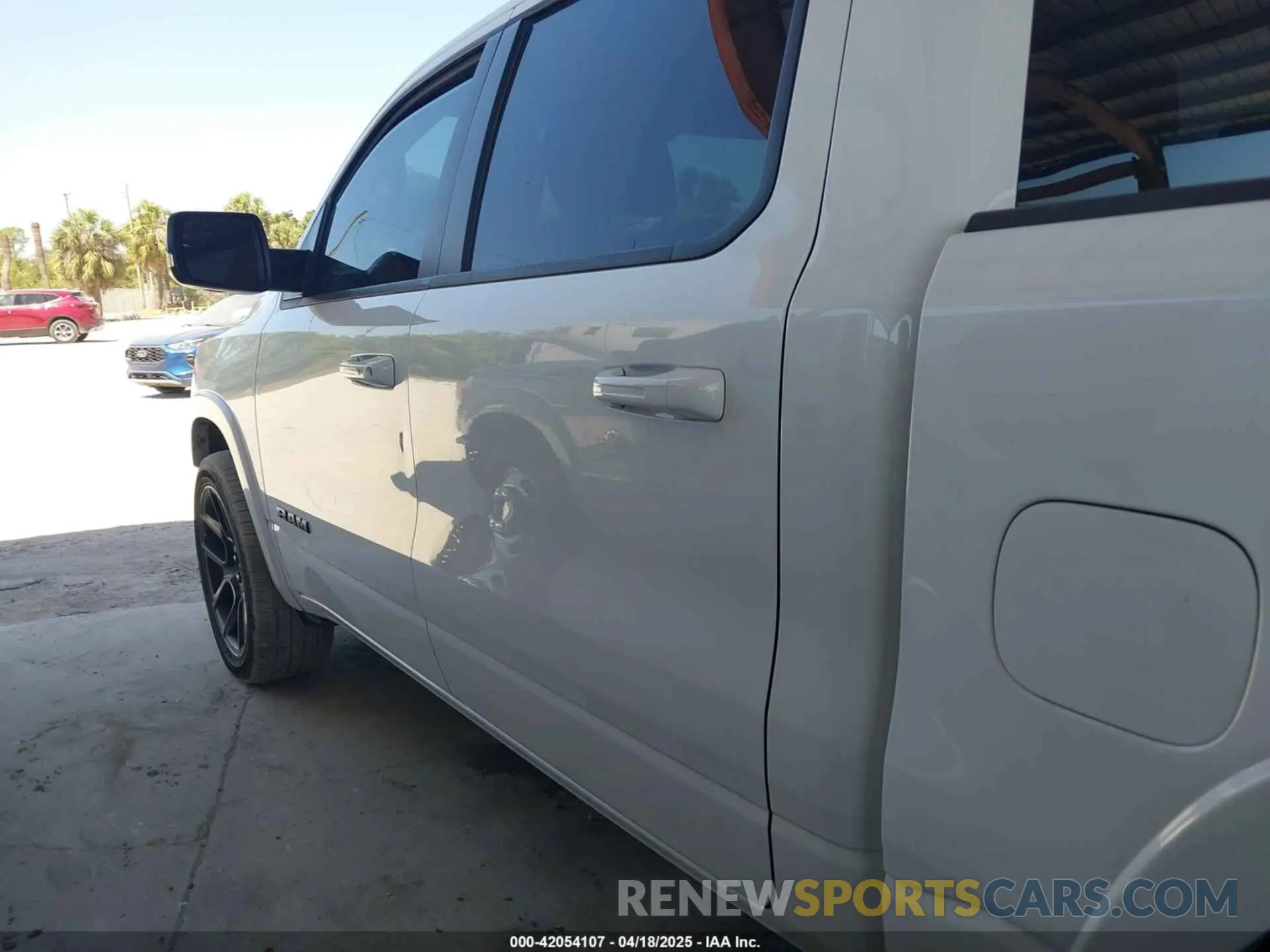 14 Photograph of a damaged car 1C6RREJTXMN794380 RAM 1500 2021
