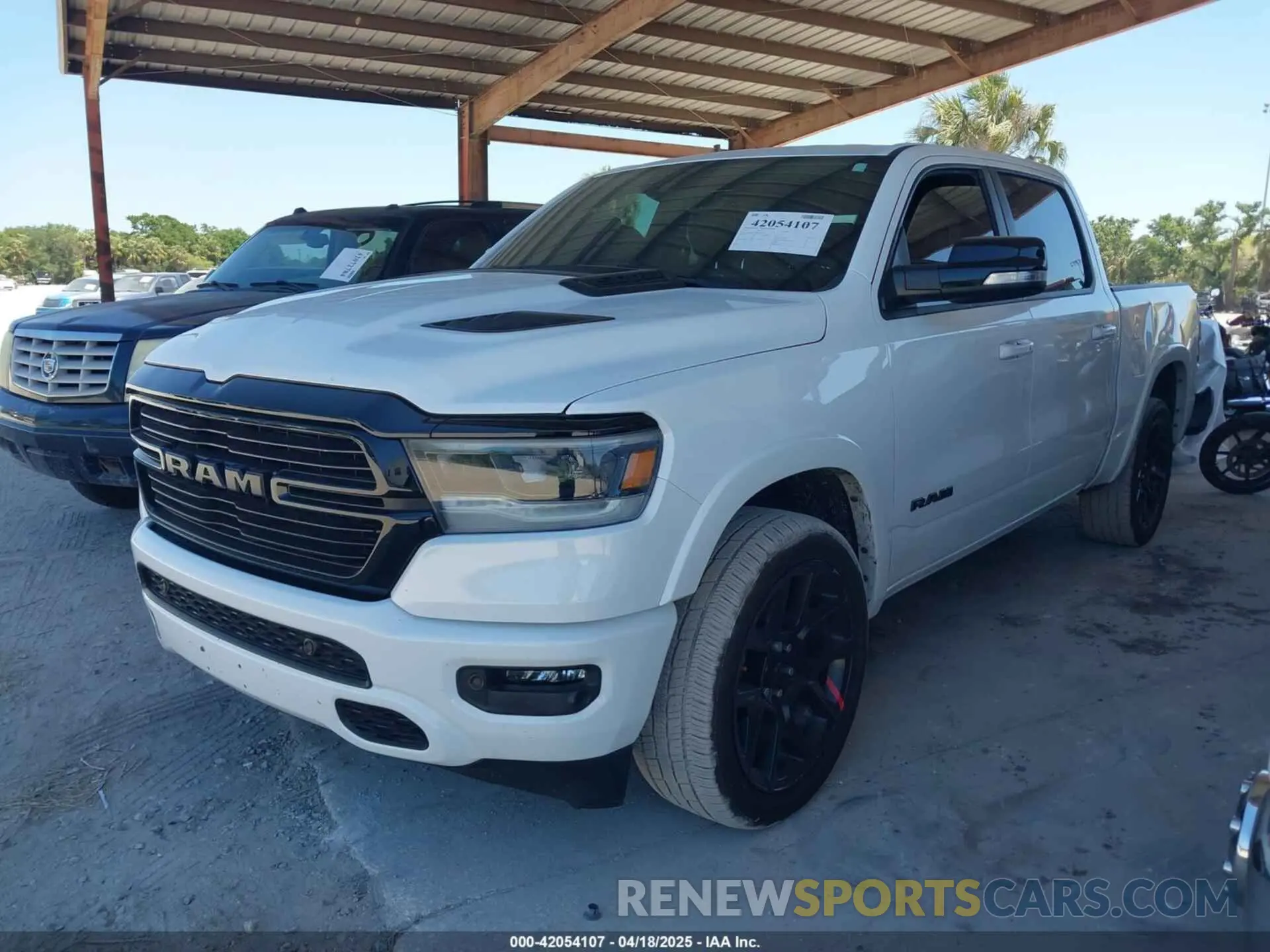 2 Photograph of a damaged car 1C6RREJTXMN794380 RAM 1500 2021