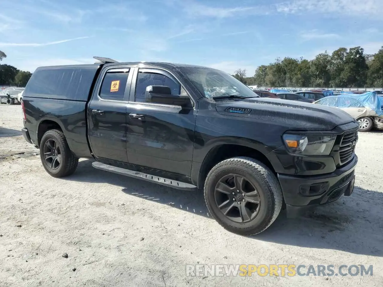 4 Photograph of a damaged car 1C6RRFBG4MN722100 RAM 1500 2021