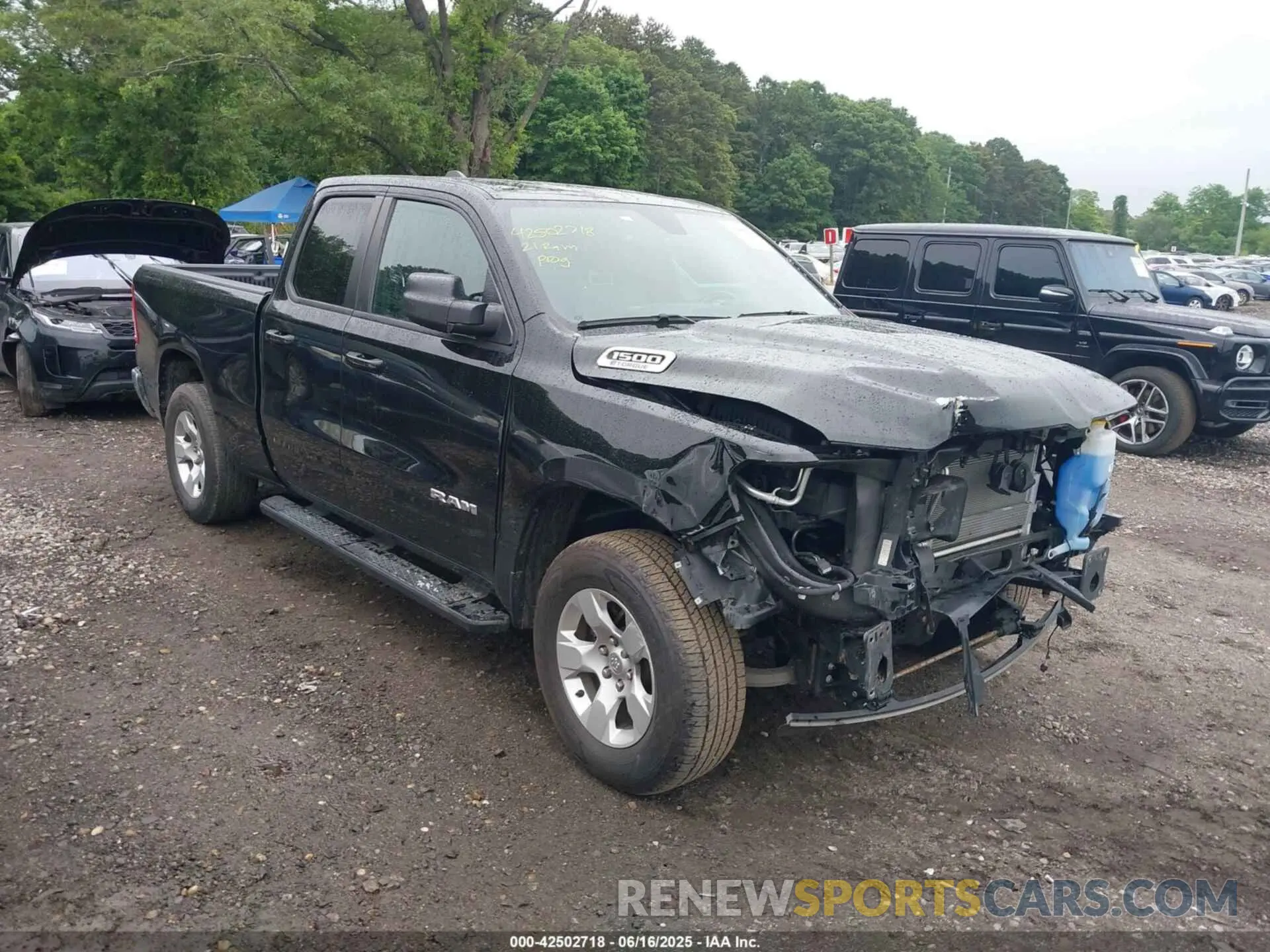 1 Photograph of a damaged car 1C6RRFBG8MN784325 RAM 1500 2021
