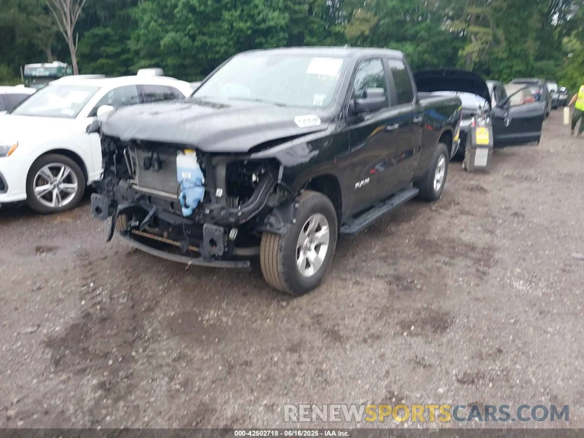 2 Photograph of a damaged car 1C6RRFBG8MN784325 RAM 1500 2021