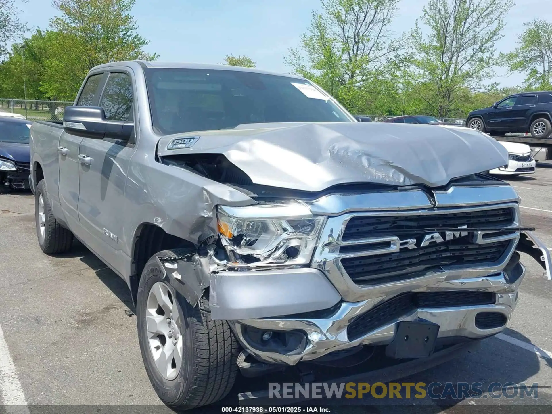 1 Photograph of a damaged car 1C6RRFBG9MN734212 RAM 1500 2021