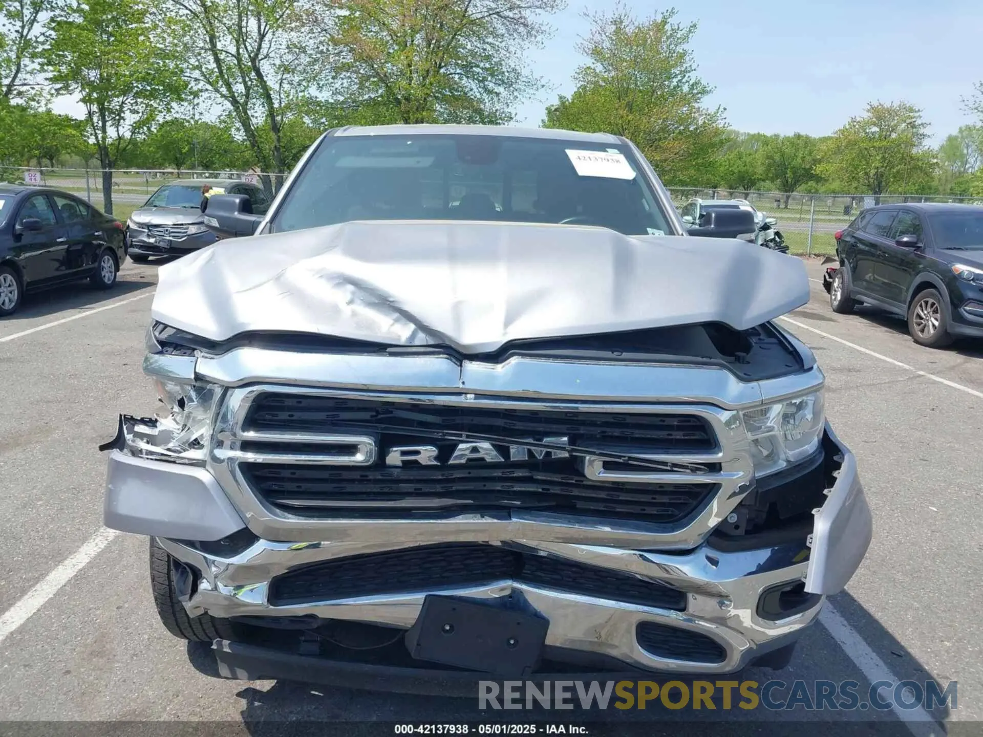 12 Photograph of a damaged car 1C6RRFBG9MN734212 RAM 1500 2021