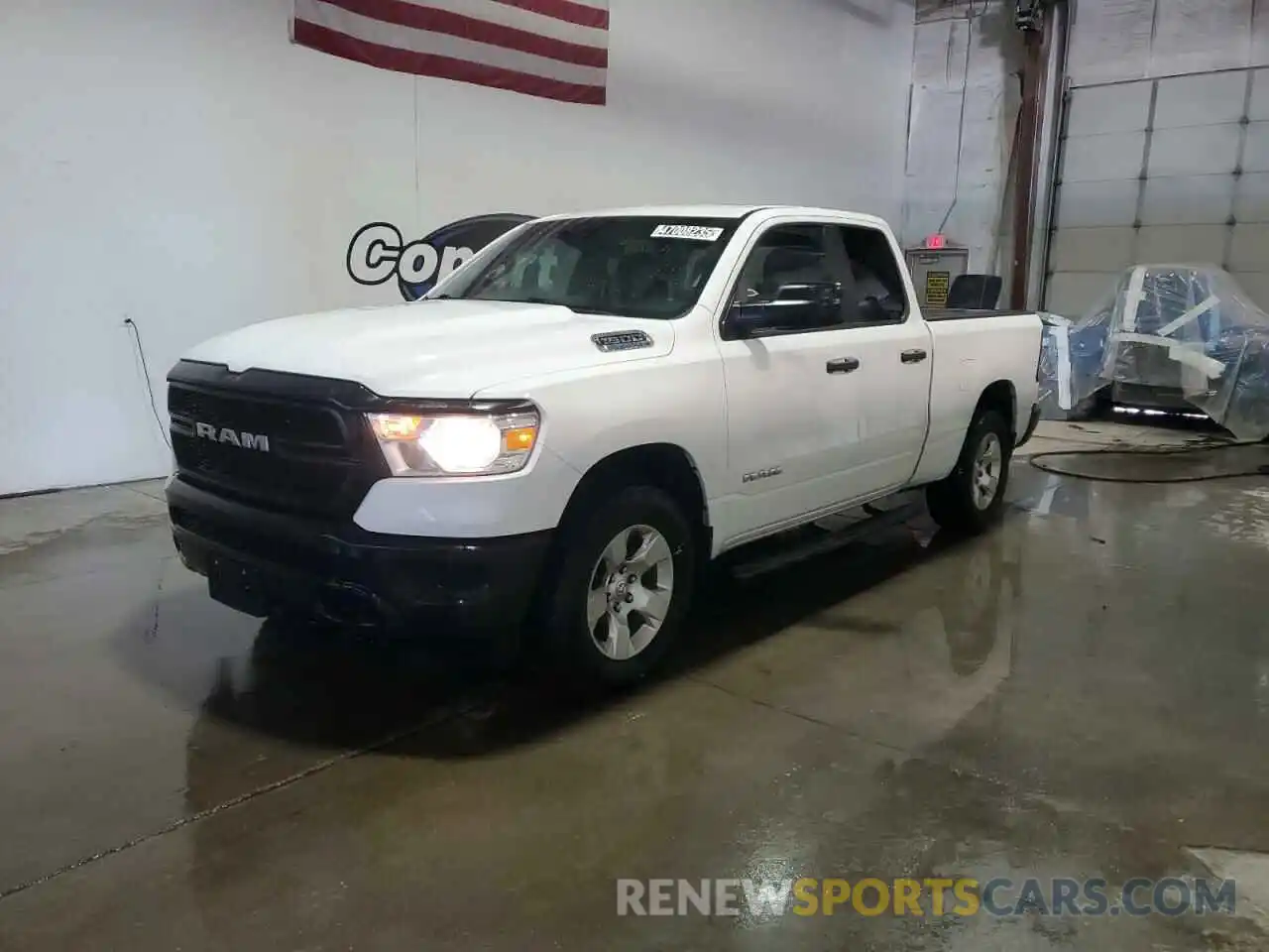 1 Photograph of a damaged car 1C6RRFCG3MN738657 RAM 1500 2021