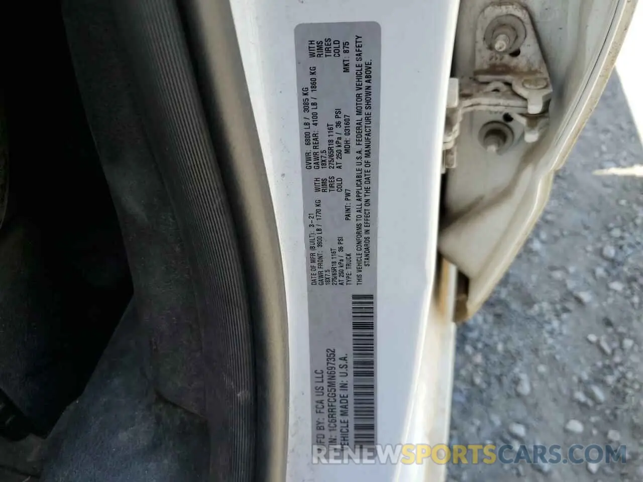 12 Photograph of a damaged car 1C6RRFCG5MN697352 RAM 1500 2021