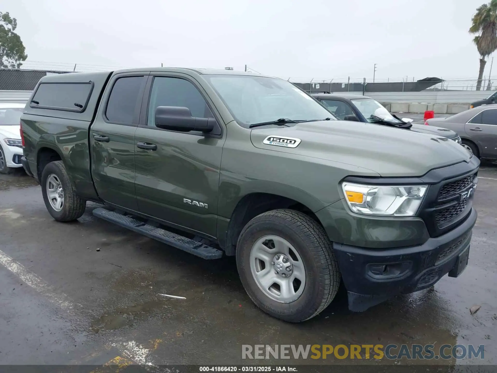 1 Photograph of a damaged car 1C6RRFCGXMN714260 RAM 1500 2021