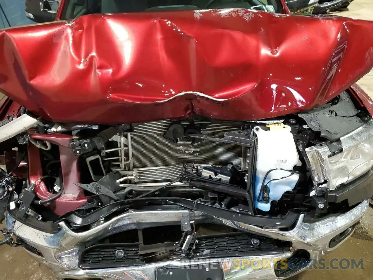 11 Photograph of a damaged car 1C6RRFFG0MN784541 RAM 1500 2021