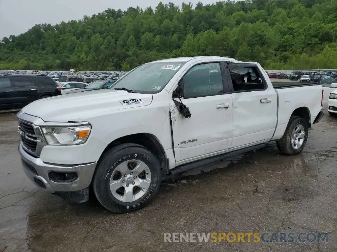1 Photograph of a damaged car 1C6RRFFG2MN627979 RAM 1500 2021
