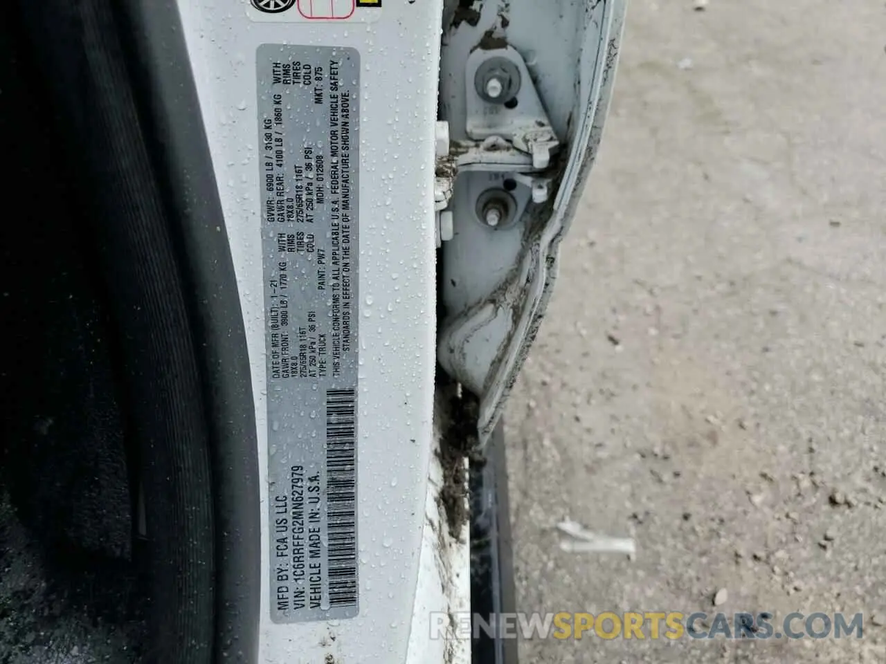 12 Photograph of a damaged car 1C6RRFFG2MN627979 RAM 1500 2021