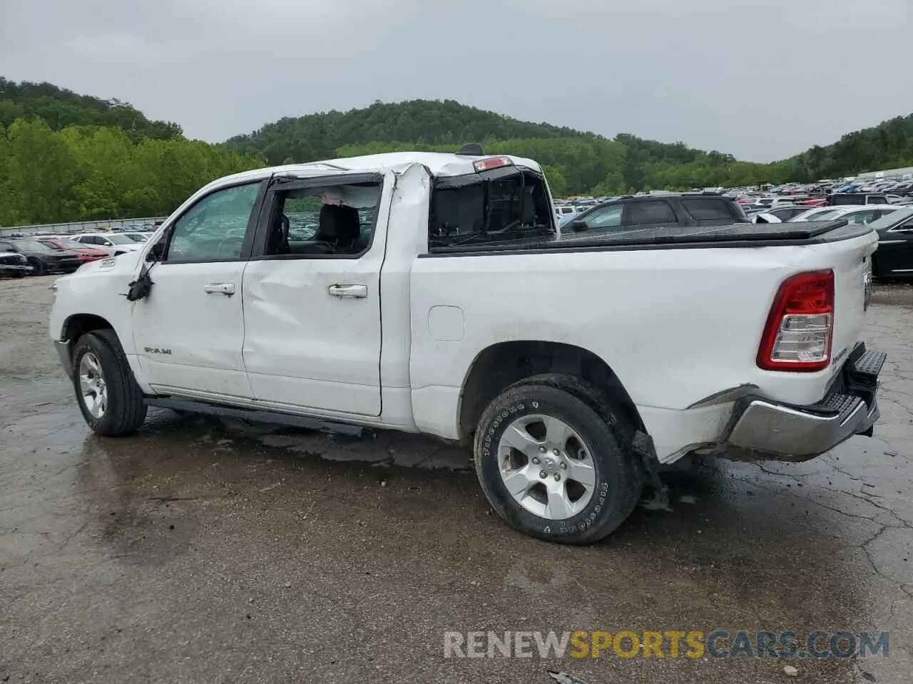 2 Photograph of a damaged car 1C6RRFFG2MN627979 RAM 1500 2021
