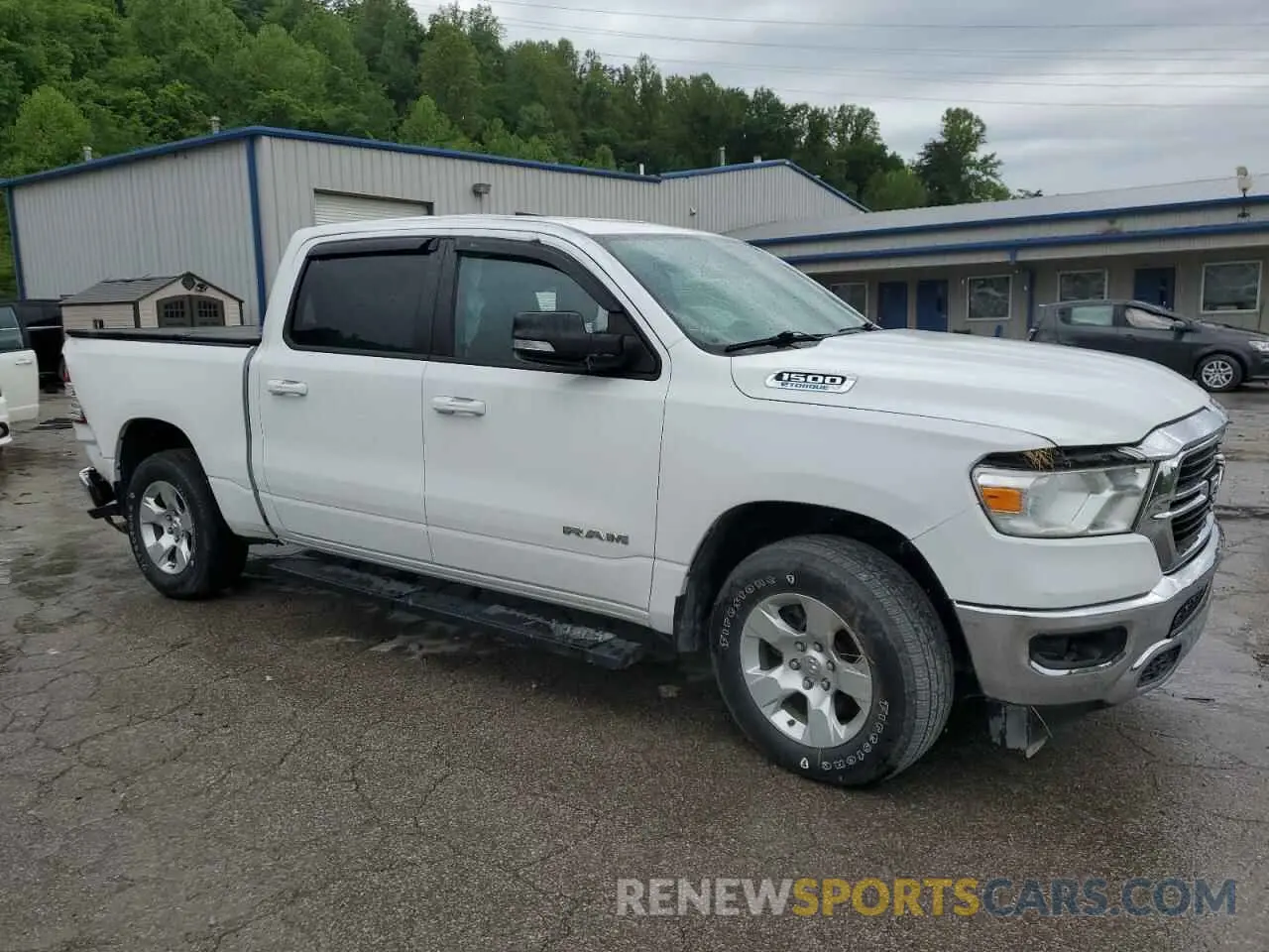 4 Photograph of a damaged car 1C6RRFFG2MN627979 RAM 1500 2021