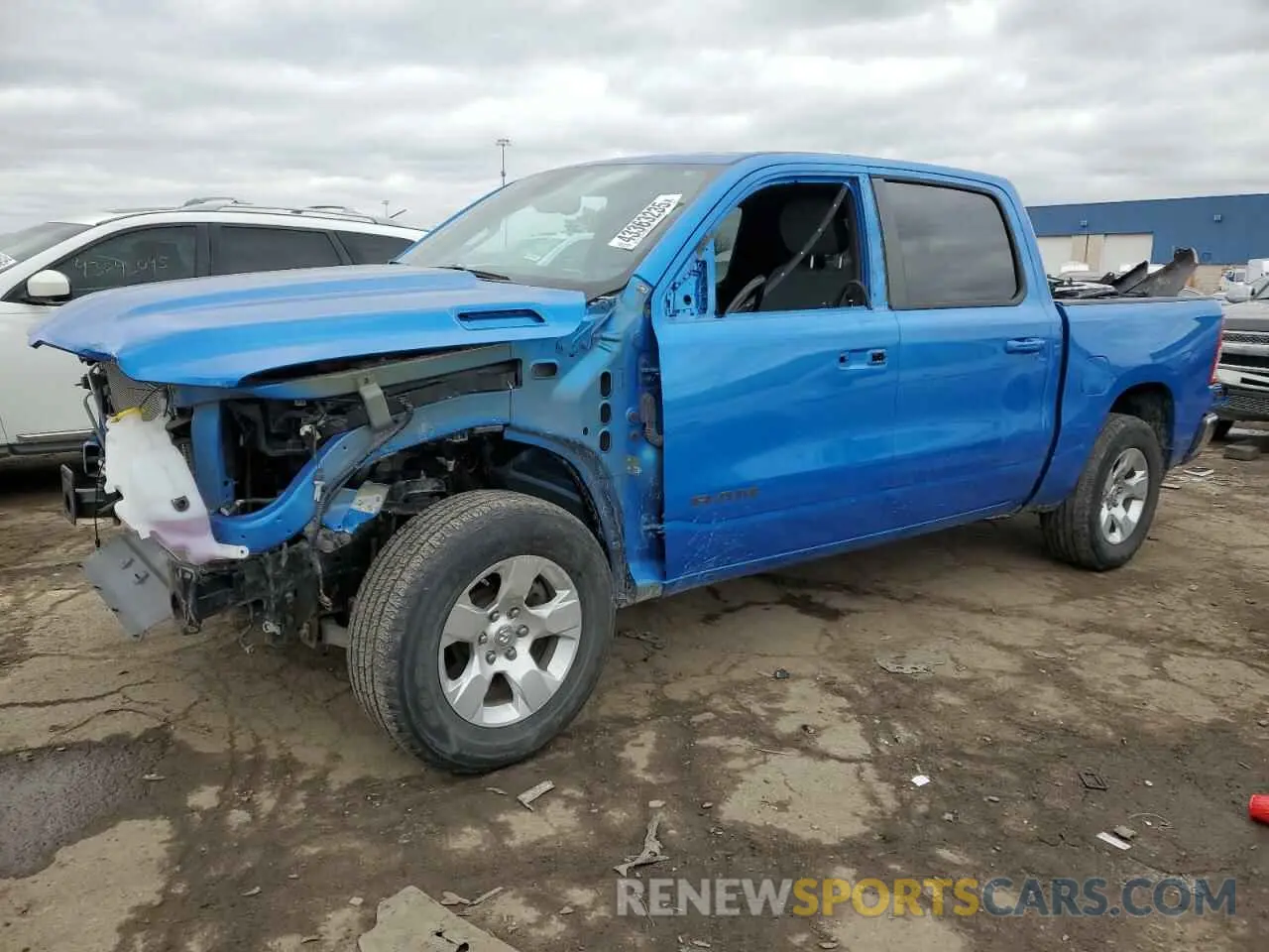 1 Photograph of a damaged car 1C6RRFFG3MN645360 RAM 1500 2021