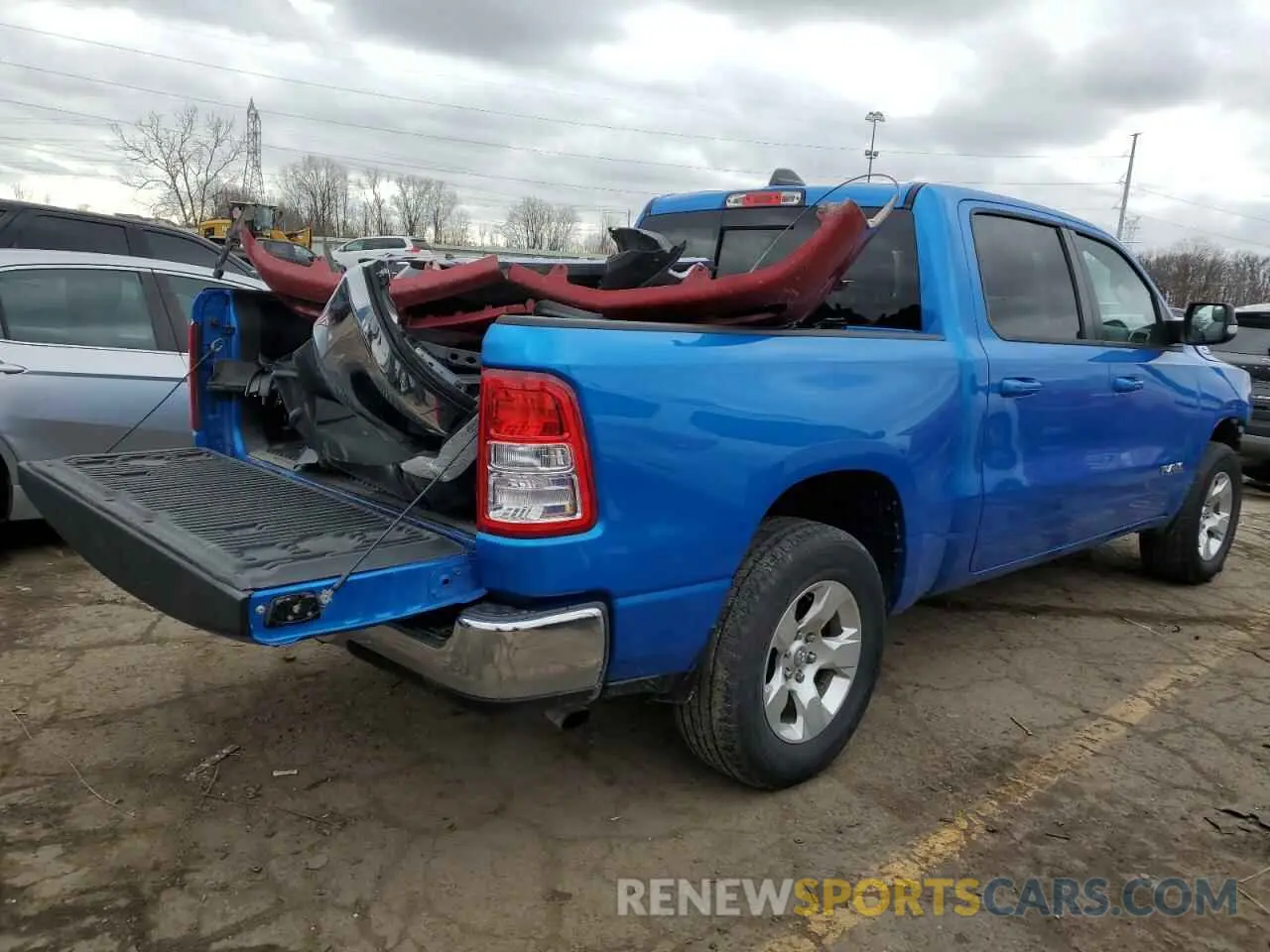 3 Photograph of a damaged car 1C6RRFFG3MN645360 RAM 1500 2021