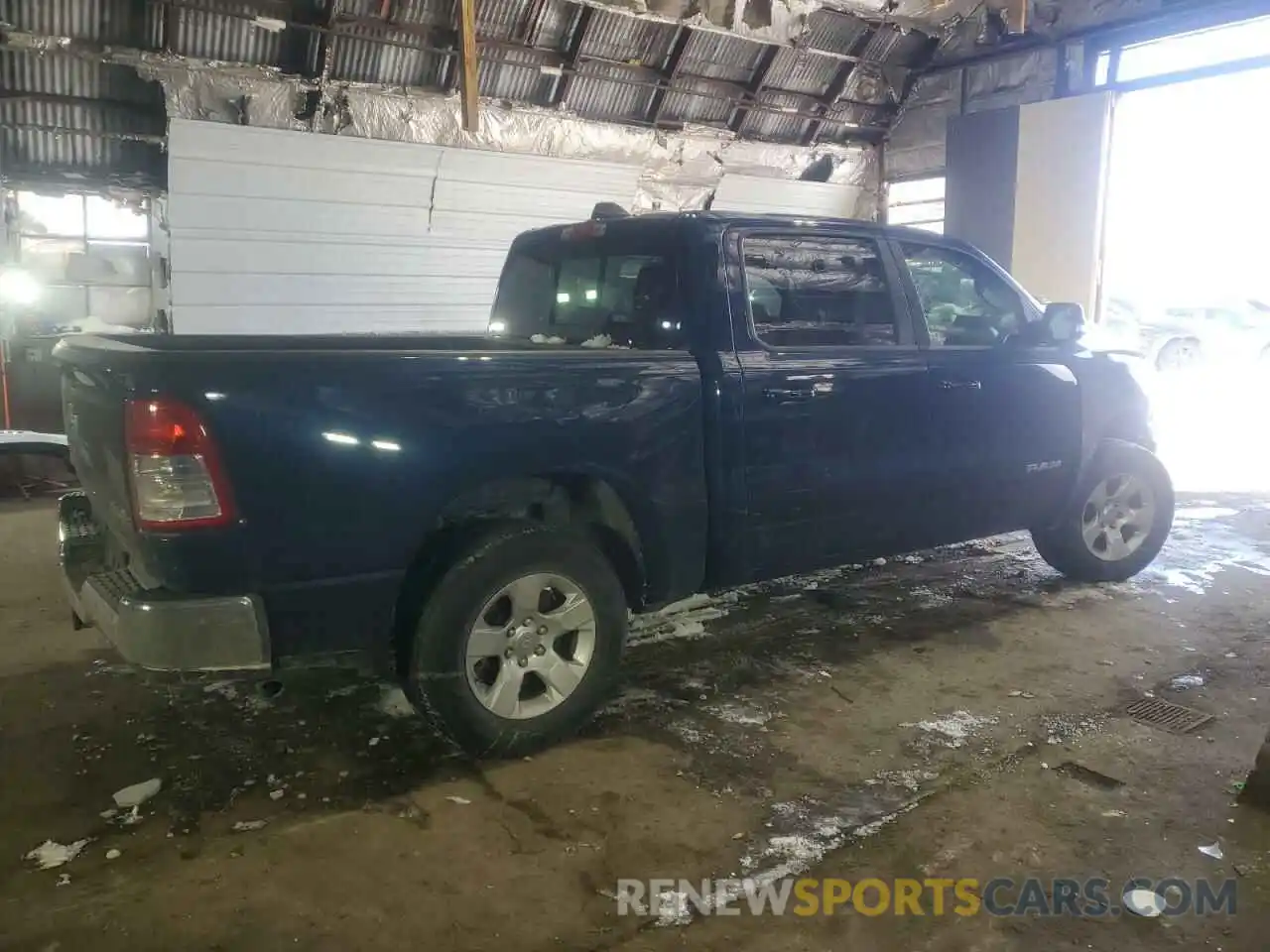 3 Photograph of a damaged car 1C6RRFFG4MN560947 RAM 1500 2021