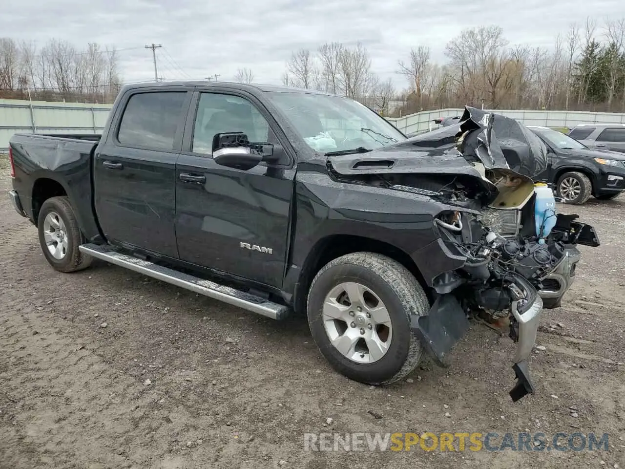 4 Photograph of a damaged car 1C6RRFFG4MN616434 RAM 1500 2021