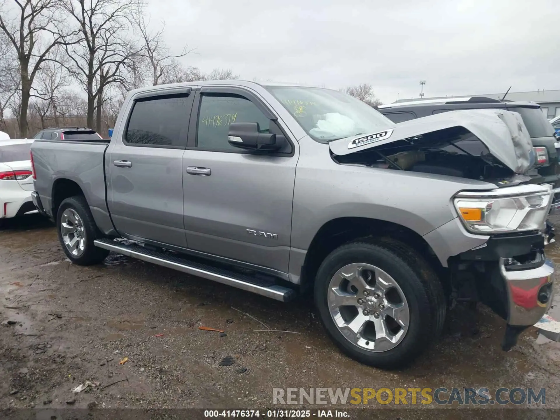 13 Photograph of a damaged car 1C6RRFFG8MN723311 RAM 1500 2021