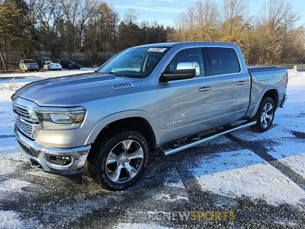 1 Photograph of a damaged car 1C6RRFJG9MN583972 RAM 1500 2021