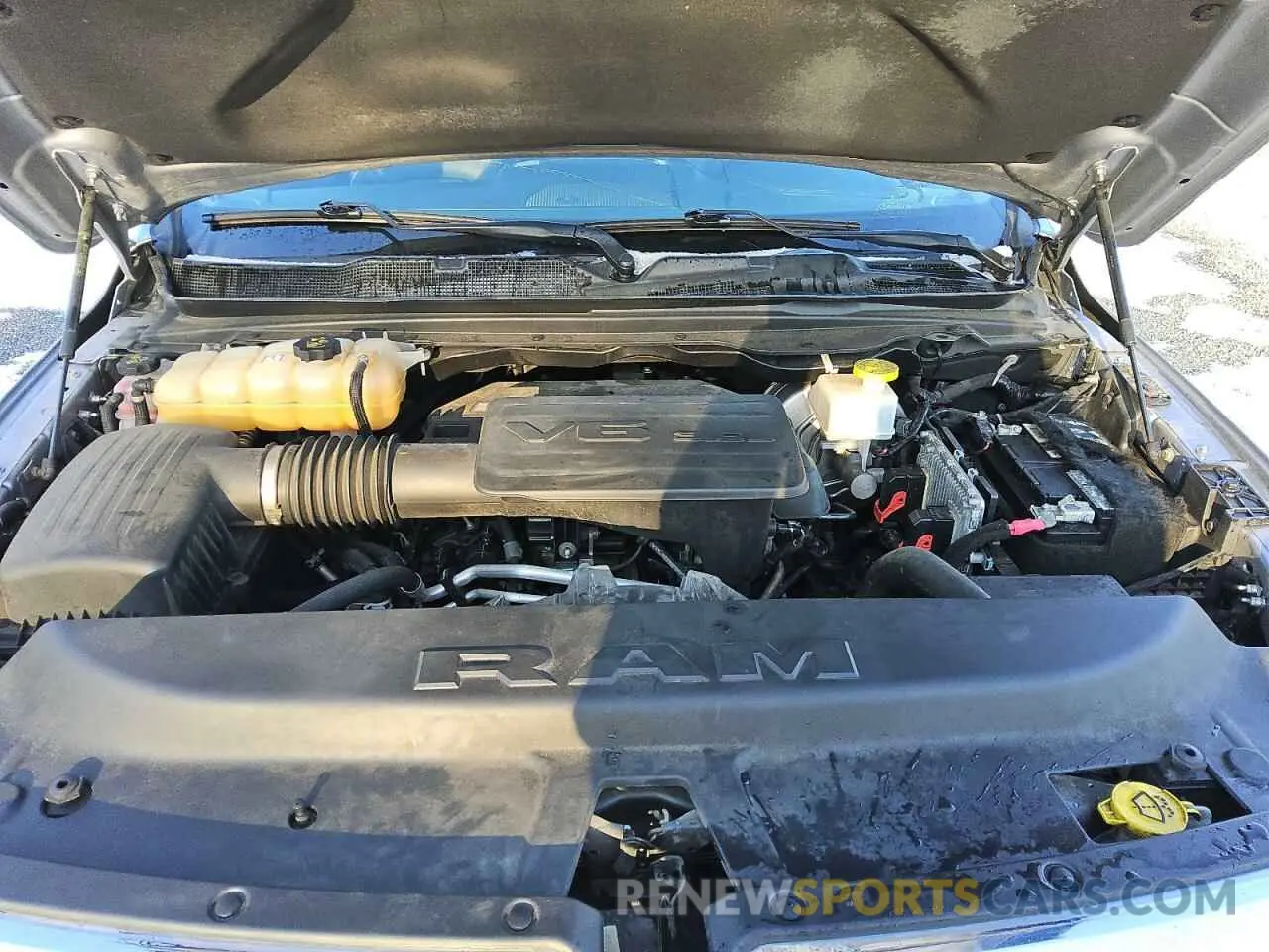 11 Photograph of a damaged car 1C6RRFJG9MN583972 RAM 1500 2021