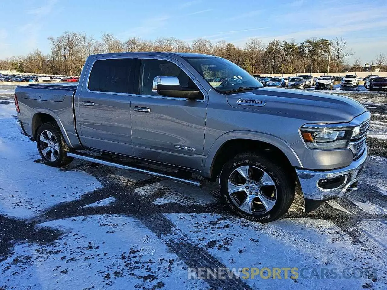 4 Photograph of a damaged car 1C6RRFJG9MN583972 RAM 1500 2021