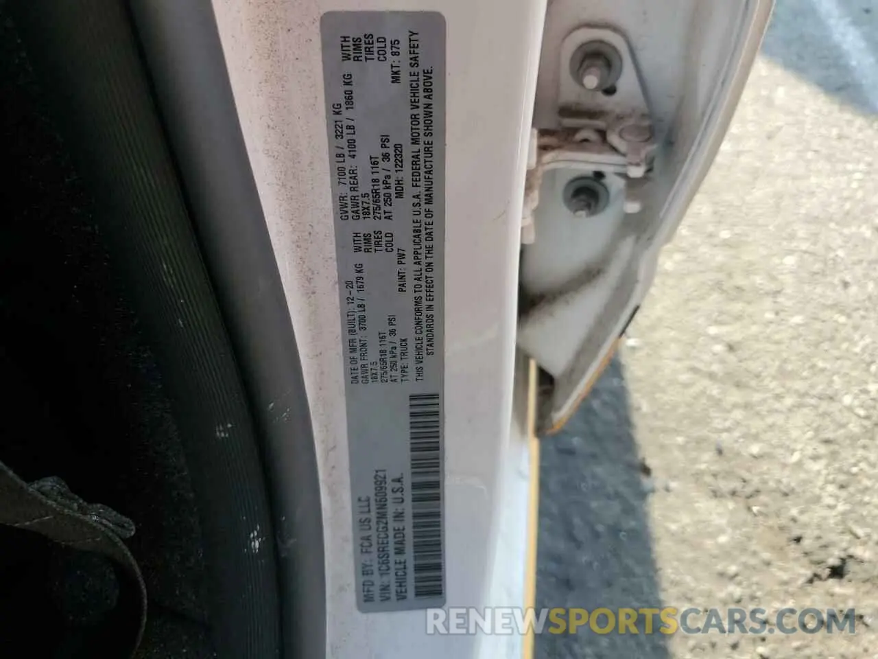12 Photograph of a damaged car 1C6SRECG2MN609921 RAM 1500 2021
