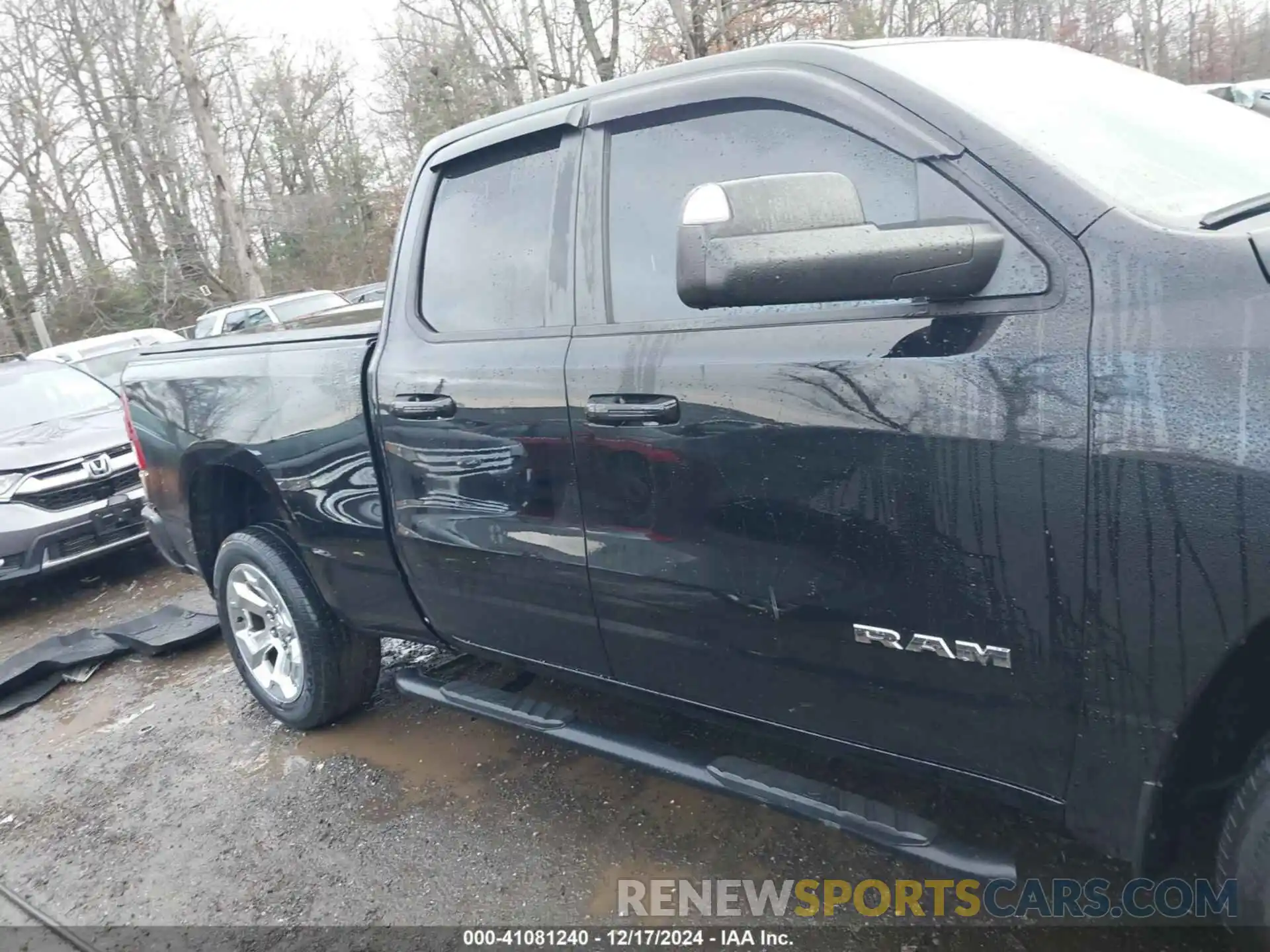 14 Photograph of a damaged car 1C6SRFBT0MN556611 RAM 1500 2021