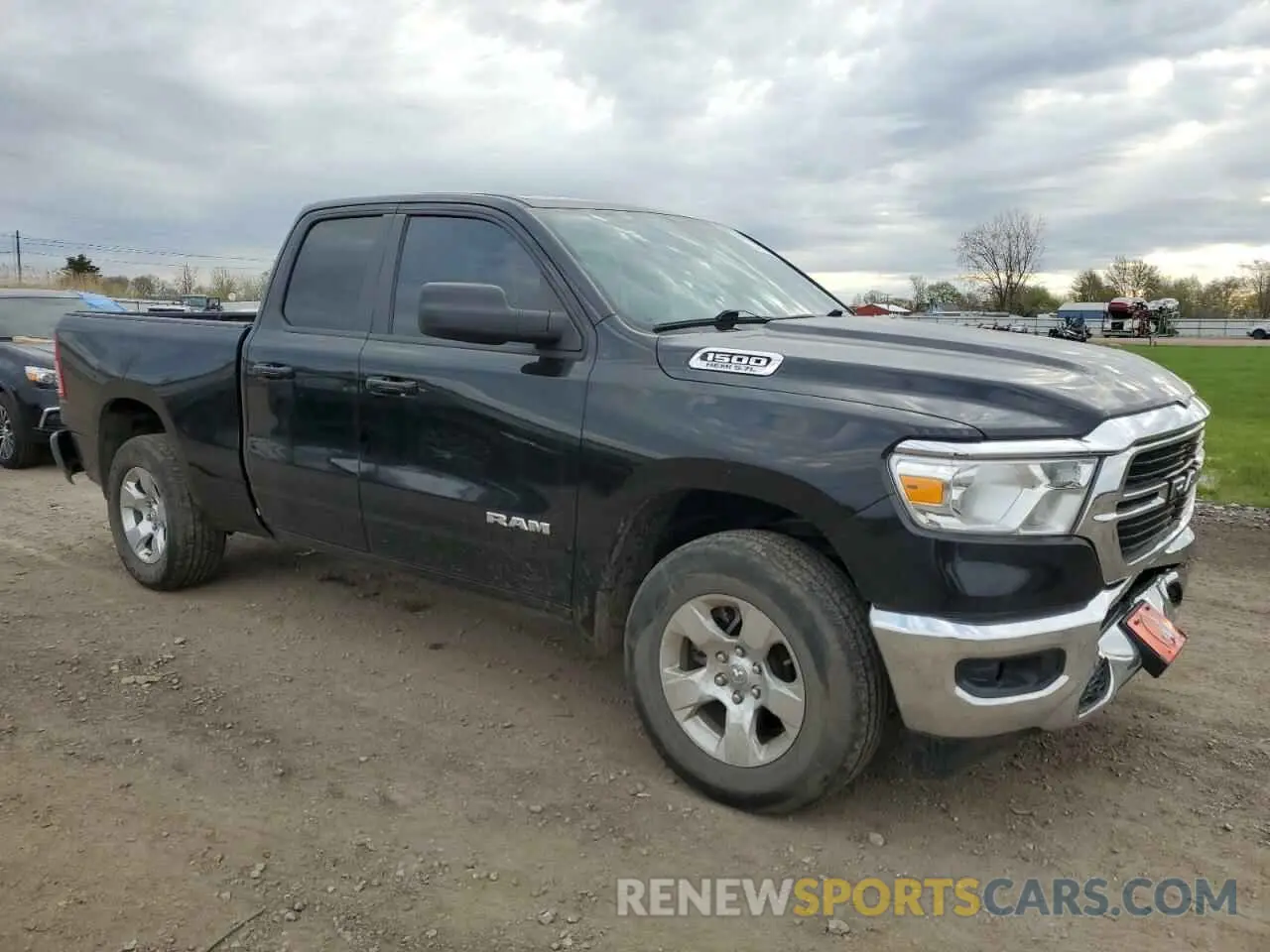 4 Photograph of a damaged car 1C6SRFBT0MN699834 RAM 1500 2021