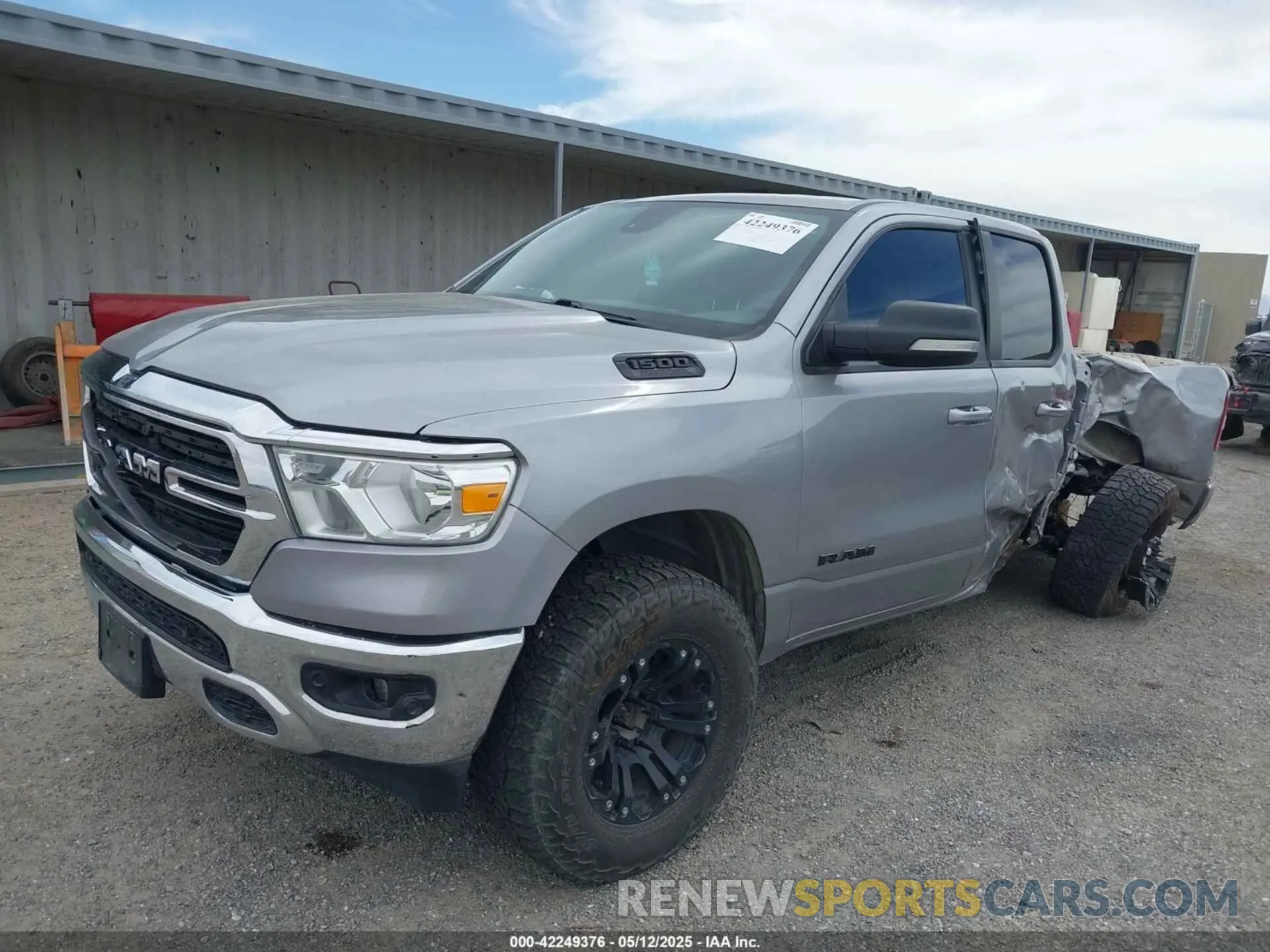 2 Photograph of a damaged car 1C6SRFBT1MN622633 RAM 1500 2021