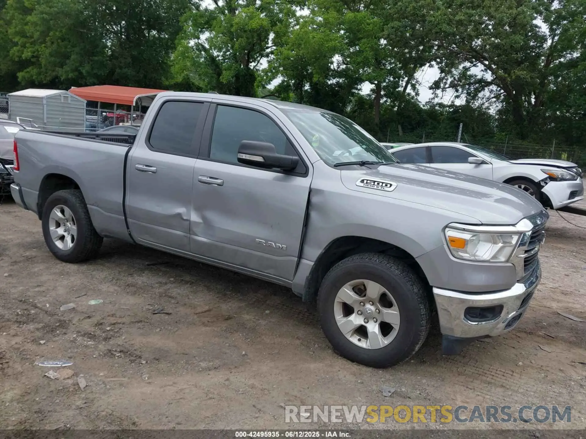 1 Photograph of a damaged car 1C6SRFBT1MN727401 RAM 1500 2021
