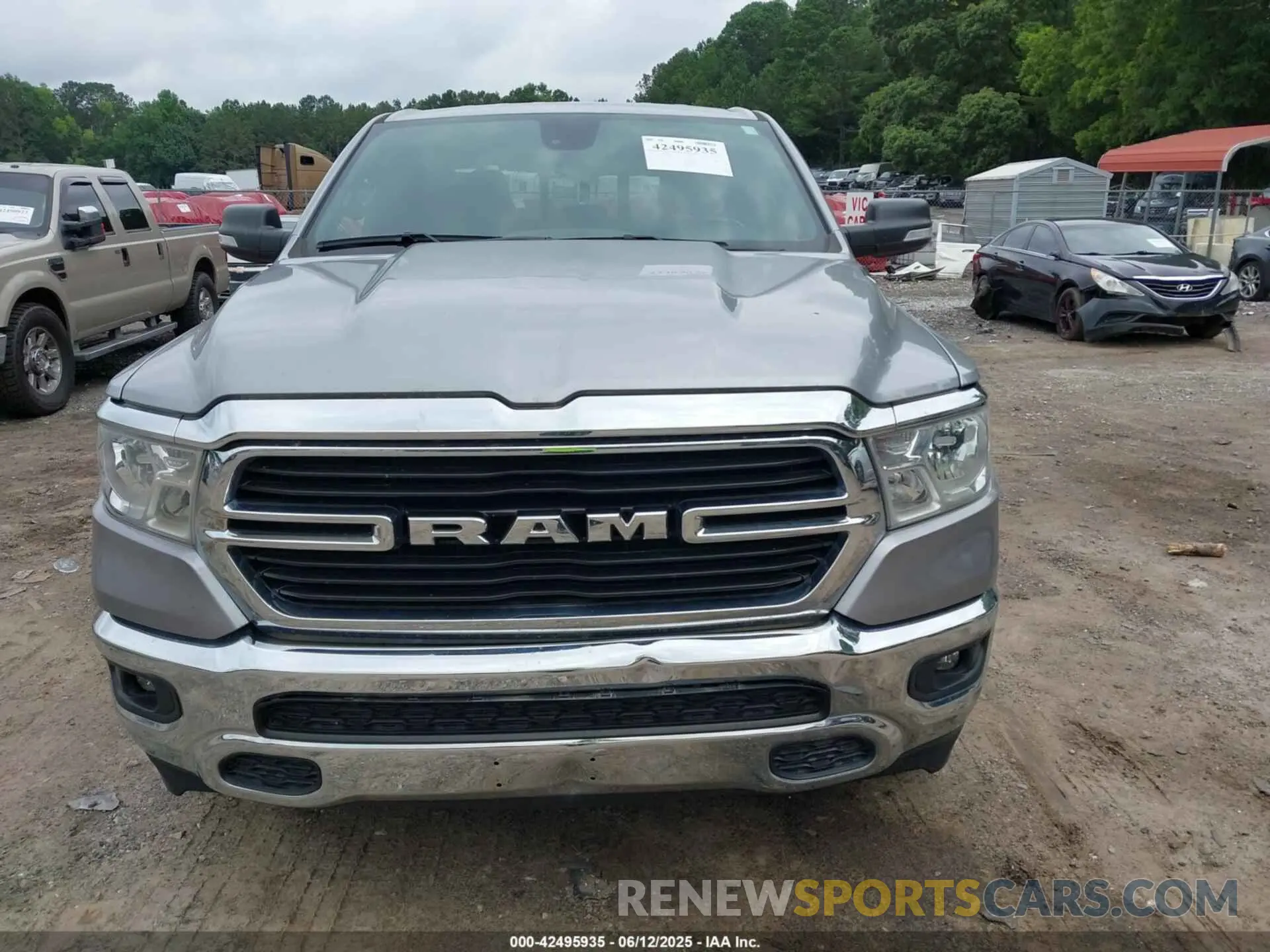 12 Photograph of a damaged car 1C6SRFBT1MN727401 RAM 1500 2021