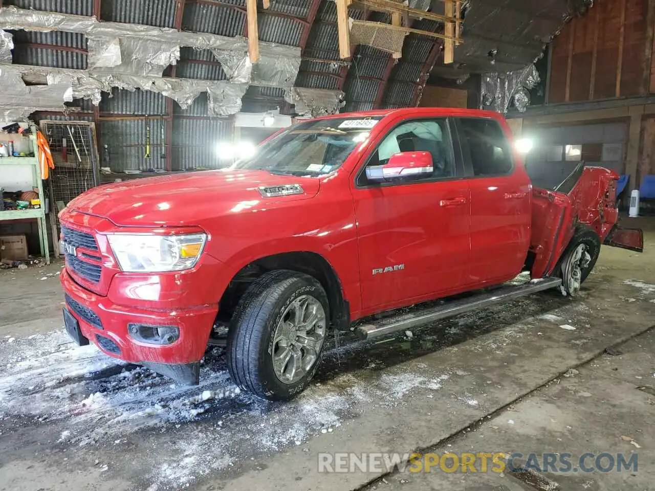 1 Photograph of a damaged car 1C6SRFBT1MN798825 RAM 1500 2021