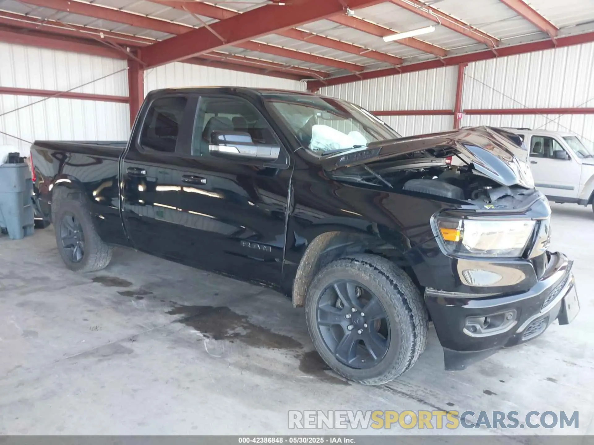 1 Photograph of a damaged car 1C6SRFBT2MN562927 RAM 1500 2021