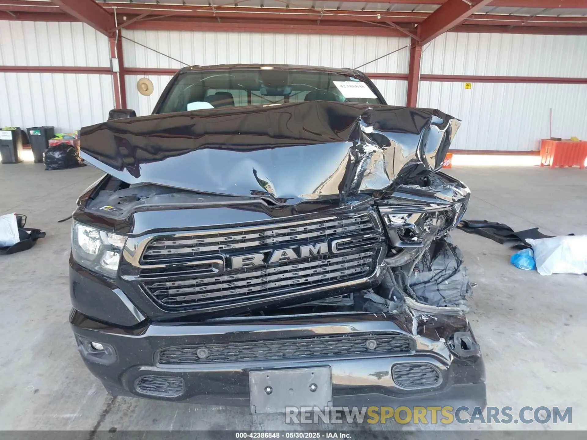 12 Photograph of a damaged car 1C6SRFBT2MN562927 RAM 1500 2021