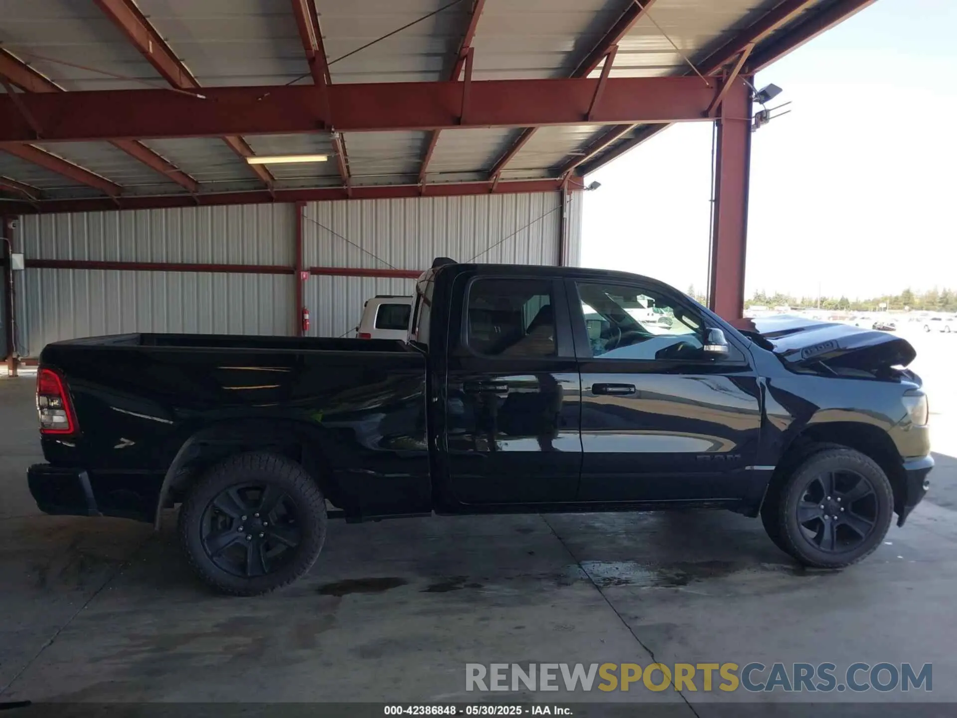13 Photograph of a damaged car 1C6SRFBT2MN562927 RAM 1500 2021