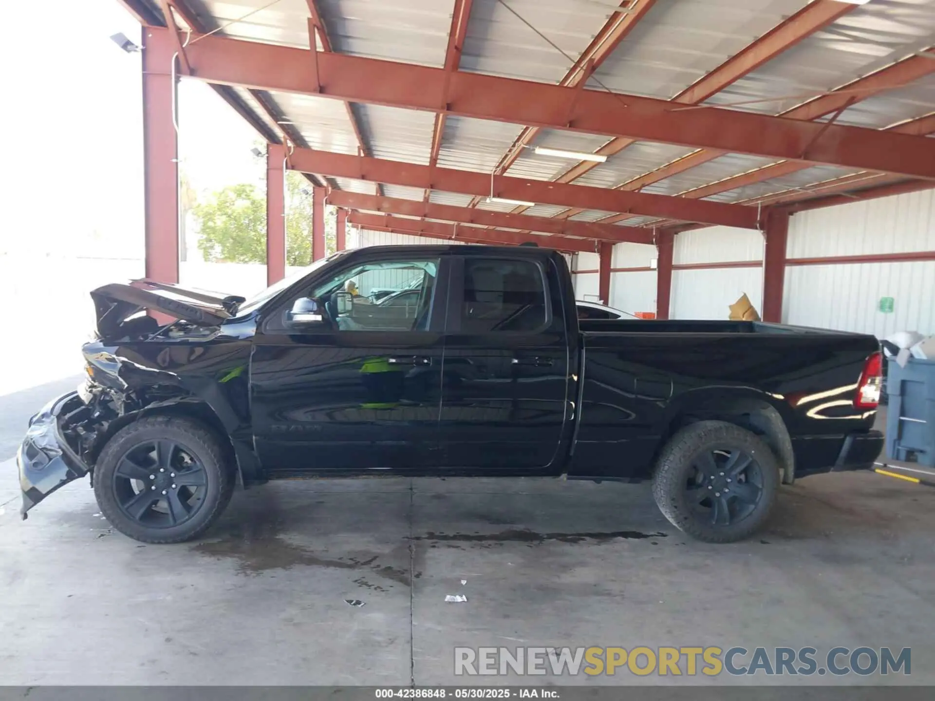 14 Photograph of a damaged car 1C6SRFBT2MN562927 RAM 1500 2021