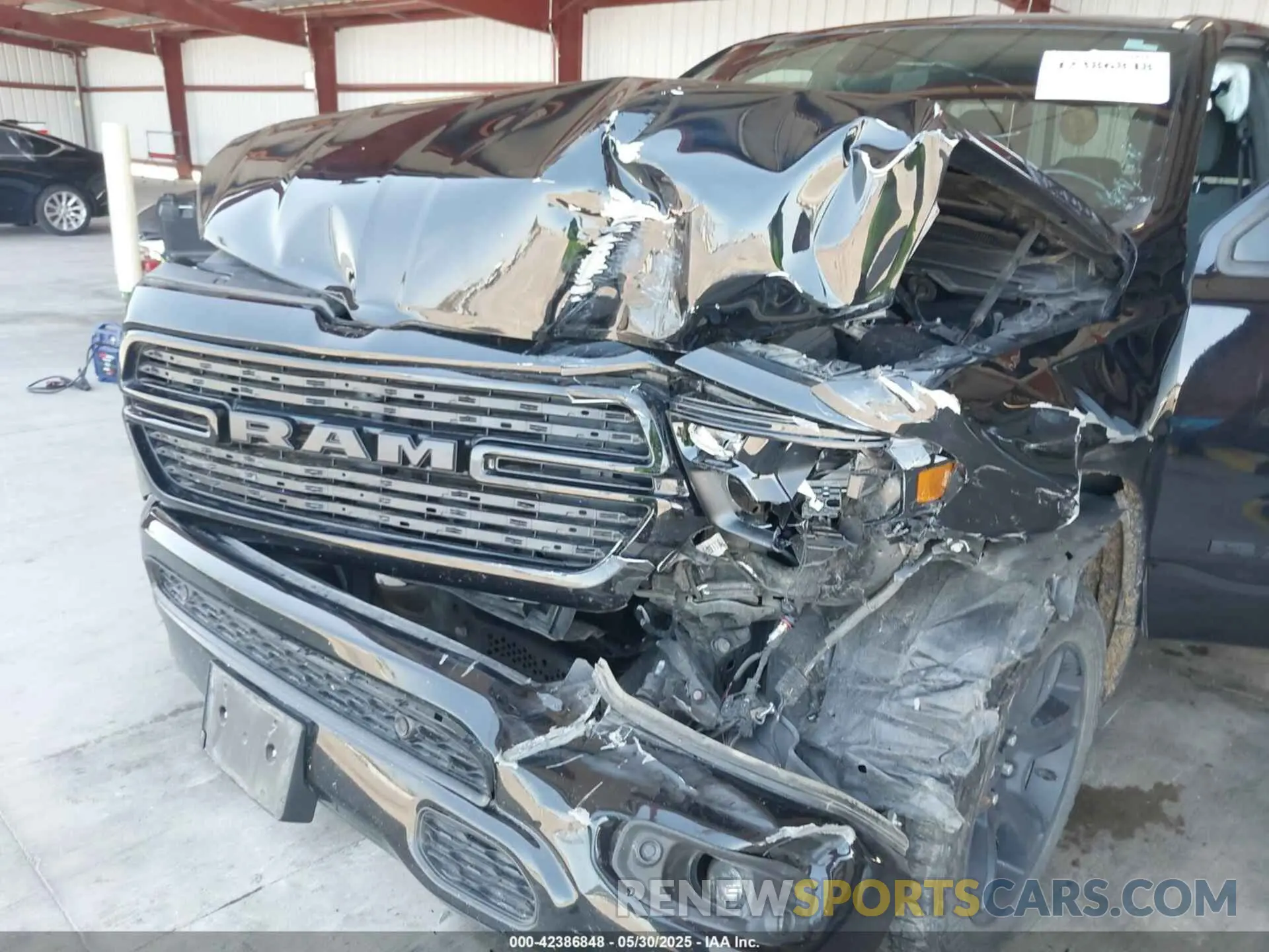 6 Photograph of a damaged car 1C6SRFBT2MN562927 RAM 1500 2021