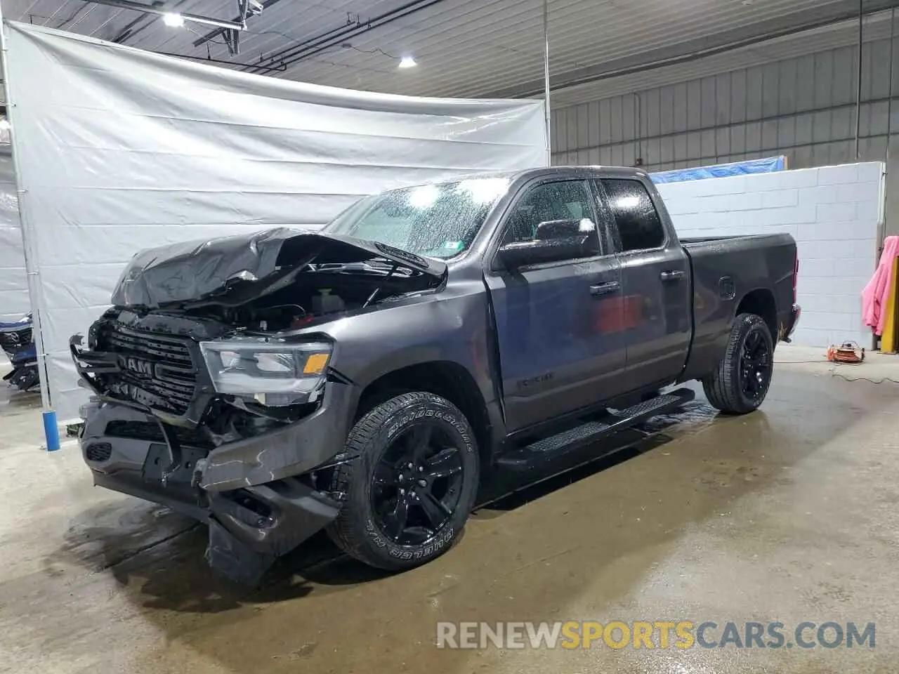 1 Photograph of a damaged car 1C6SRFBT2MN738102 RAM 1500 2021