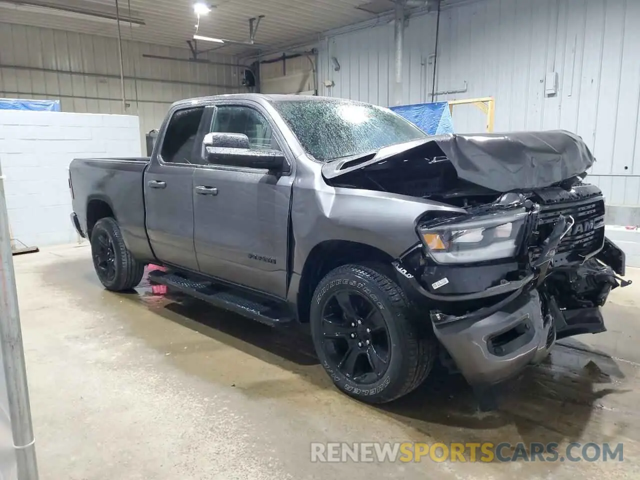 4 Photograph of a damaged car 1C6SRFBT2MN738102 RAM 1500 2021