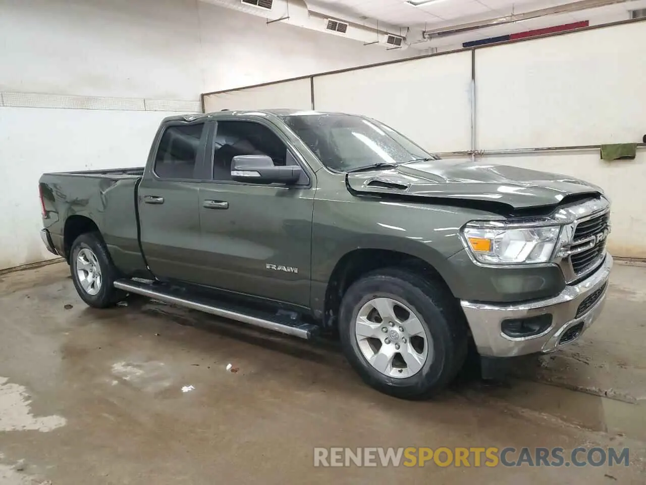 4 Photograph of a damaged car 1C6SRFBT3MN696054 RAM 1500 2021