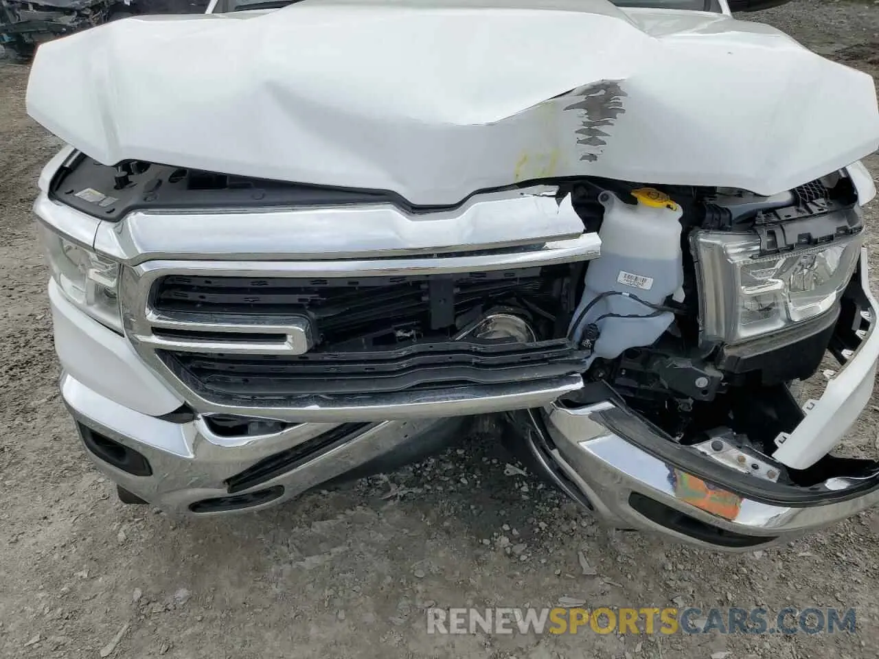 11 Photograph of a damaged car 1C6SRFBT3MN698242 RAM 1500 2021