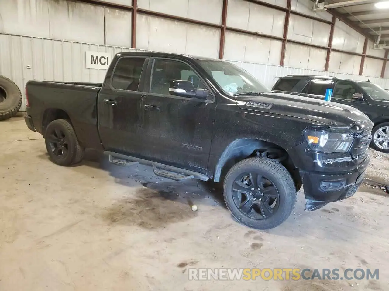 4 Photograph of a damaged car 1C6SRFBT3MN741073 RAM 1500 2021